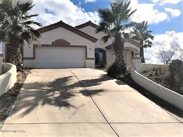 Lovely home located on hilltop with panoramic views of Santa Cruz Valley.