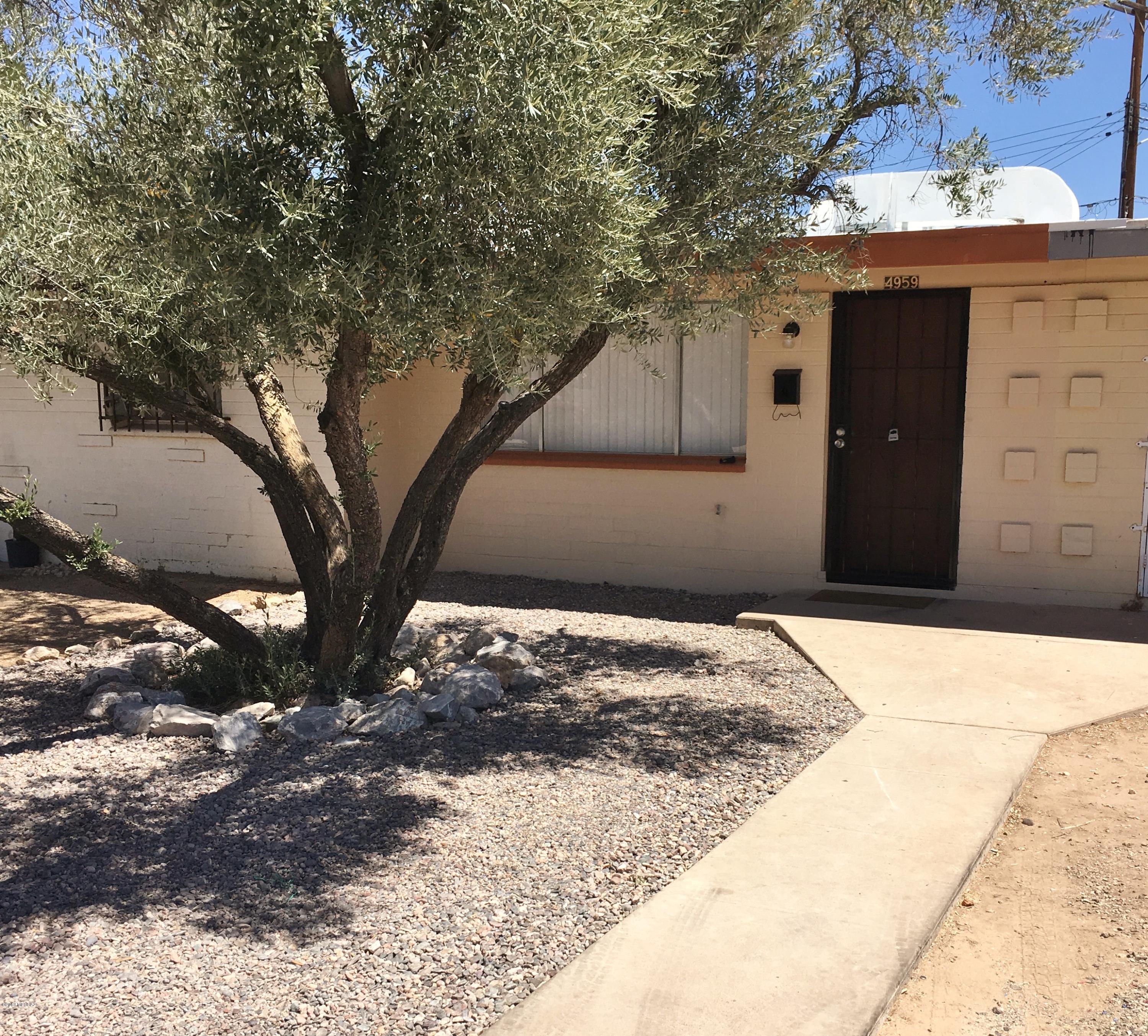 Move-in Ready!  Completely remodeled home with all new ceramic tile and window blinds throughout.  All new bath tub and ceramic tiled shower.  Walk-in closets.  Central AC.  Covered back patio with privacy fenced yard. Freshly painted inside and out.  Owner will carry with good terms available.  Owner/Agent.