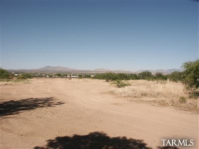 Zoned business (B2), 3 acres close to the main street of Benson. Great location for a storage yard, plant nursery etc. The property is triangular shaped along the rail road track next to a nice mobile home park. Only about 2.3 acres are currently usable. The east section has nice trees that could make a nice park setting. Street is paved to the south west corner of the lot.