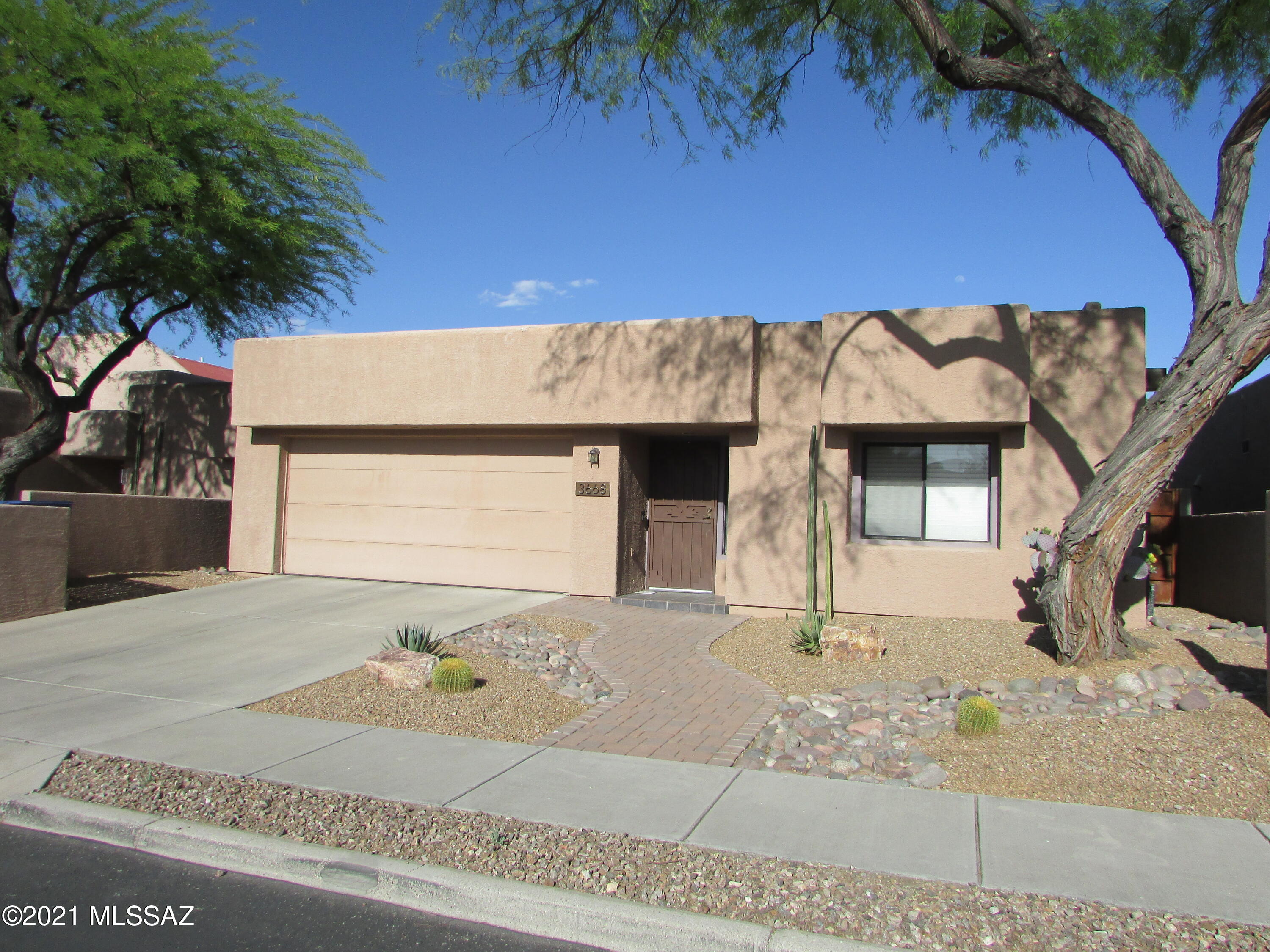 Built 2000, Centrally located in a small haven of renowned architect, John Murphy, designed homes, 3 bedroom, 2 bath, modern updates, Open split floor plan featuring formal living and dining areas, family room off kitchen, Kitchen with bar seating and large pantry, appliances include refrigerator, gas stove, microwave, dishwasher, water filtration system tenant maintenance and maintain, laundry room washer & dryer ''AS IS'', master suite with dual vanities and linen area, cozy back courtyard feel, all ceramic throughout, double garage with extra storage. Pet rent $25/mo per pet-***$28 mandatory enrollment in Resident Benefit Package. Includes HVAC filter delivery, cable internet concierge services, and more! Ask agent for details***