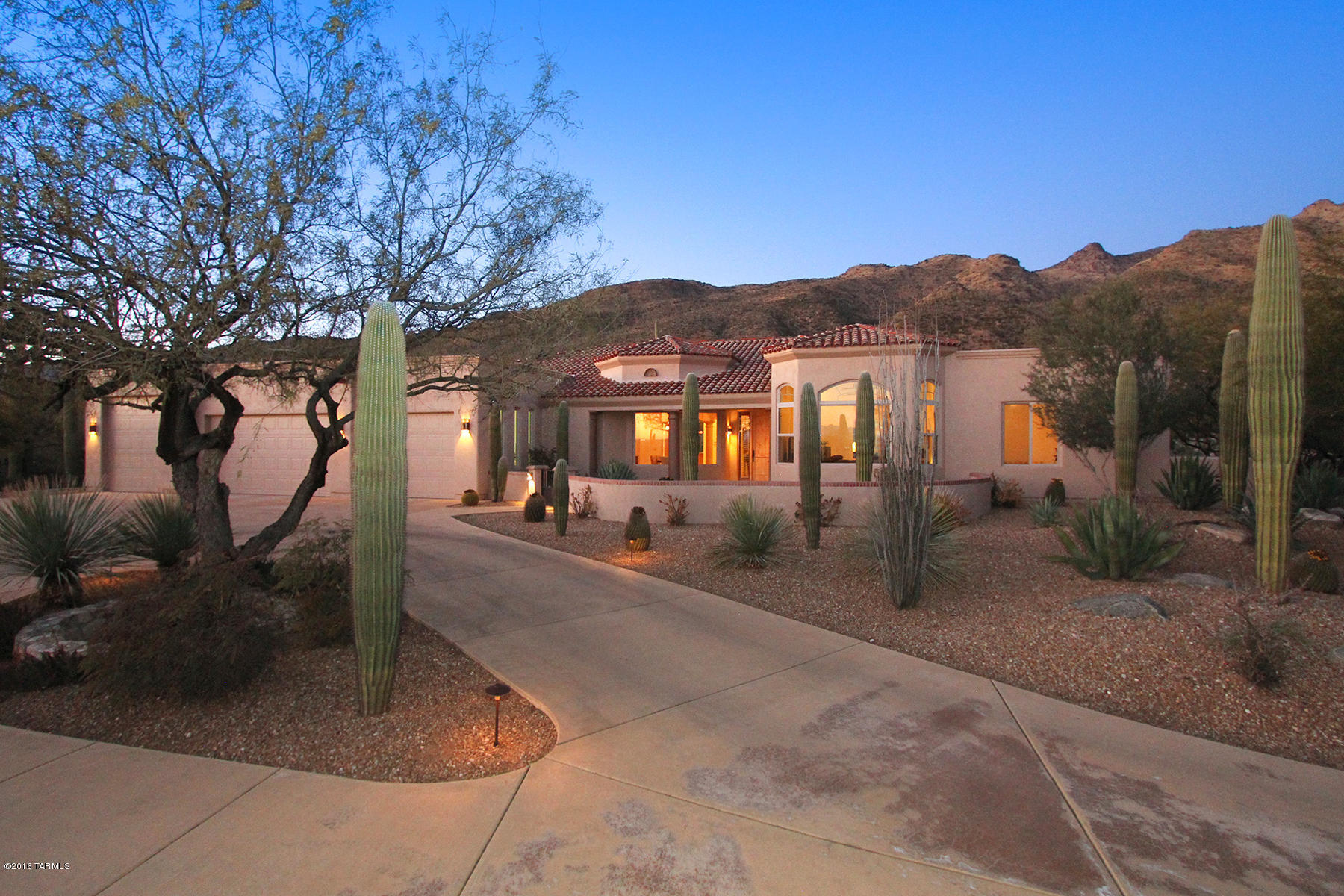 T.A.R. HOME TOUR WINNER! PANORAMIC MOUNTAIN SPLENDOR in this superbly built & impeccably maintained property in coveted Fetzer Ranch/Saguaro Hills, close to AZ Nat'l CC.This one level owner-crafted residence pairs tranquility & sensibility in its indoor & outdoor spaces.The integrity of the design affords soaring ceilings, solid Alder doors & travertine & wood floors.The chef's kitchen & open floor plan make this home ideal for entertaining.Oversized great room, other media/family room, formal dining, lg kitchen island, spacious breakfast bar/eat area, & guest suite enhance the home's appeal for hosting family & friends.Enjoy the privacy of the outdoor fireplace, waterfall & pool/spa as you take in the mesmerizing vistas. Come view this amazing property in this extraordinary gated communit