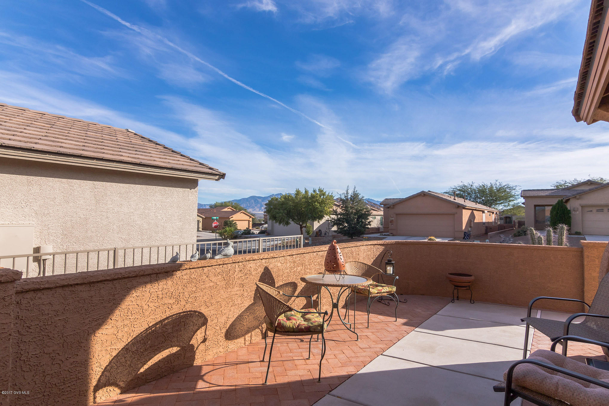 If you are looking for a perfect winter retreat or a full time home, this one is it. Situated in Las Campanas Sonata, the pride of ownership definitely shows throughout. Unmistakable curb appeal will draw you in--don't miss the mountain view as you walk through the courtyard. The alcove entrance will delight and one step inside, you'll know you've found your new home. The great room is perfect for entertaining family & friends. You'll appreciate the well laid out kitchen with its upgraded cabinets. It is loaded with extras like an AZ room, large courtyard, unique alcove entrance and more. Front and back landscaping is easy care giving you plenty of time to enjoy all the amenities that Green Valley offers. Some furniture available SBOS.