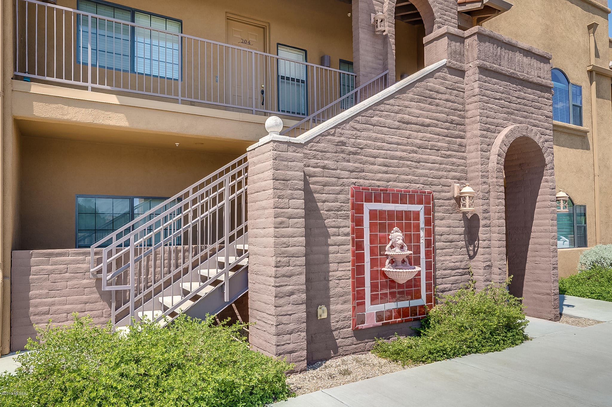 Location Unsurpassed!  Easy access to the  revered bike path called The Loop.  This model like 2 bedroom 2 bath condo has tile floors throughout, washer/dryer closet, black appliances, open kitchen, updated baths and a community pool and spa. You'll love the easy access to Restaurants, shopping, art galleries, La Encantada Mall, Oracle Rd 77, I-10 freeway, downtown Tucson, groceries, St. Phillips plaza and so much more.  A great condo for winter visiters.