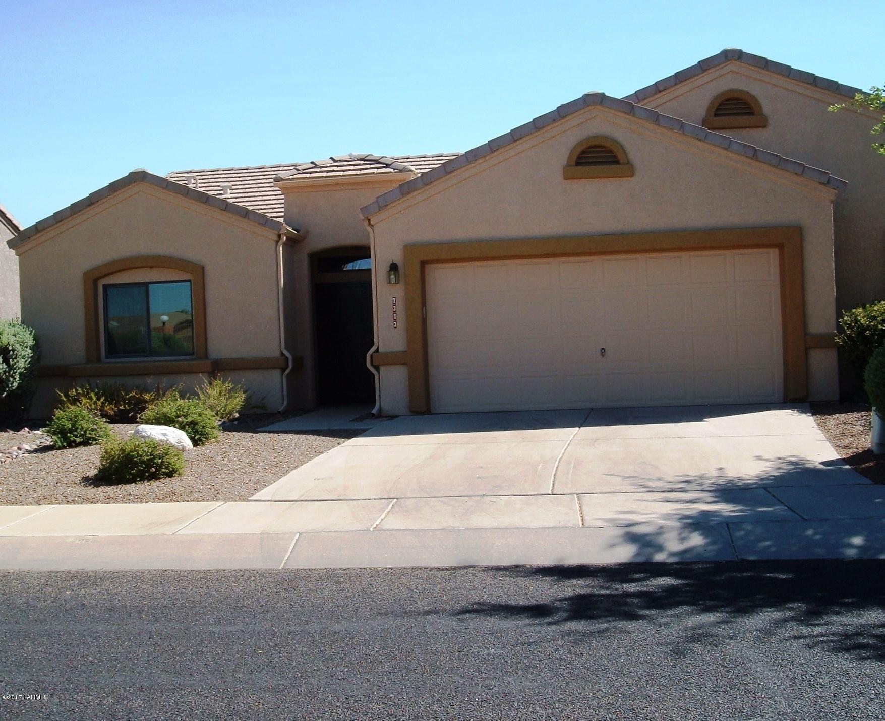 Perfect townhouse across from the community pool. Great back yard with stuccoed privacy wall, covered patio and automatic canvas awning for additional cover. Inside has pleasing custom paint, eight-foot sliding glass door to rear patio. Located next to Voyager RV Resort with access to all its activities and amenities, such as pools, spas, craft shops, entertainment, restaurant, day spa, classes, credit union ...and so much more. Great Active Adult lifestyle!!