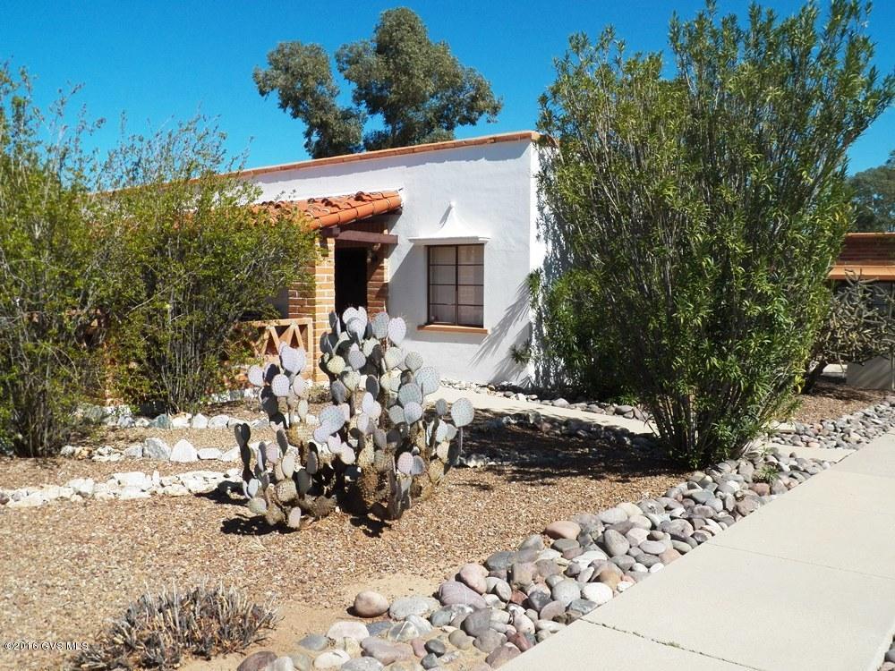 Very private 2BR villa, partially furnished, with stacked W/D in rear storage shed. Full size gas range and refrigerator. Clean, light interior. Gated front courtyard. Screened front and rear doors. Near community pool. Currently this villa does not have a membership to GV Recreation. It can be added. Villas West HOA maintains exterior including paint/stucco, HVAC unit, water heater, roof repair/replacement, landscaping, blanket insurance policy, streets, pools/spas, parks. Water usage and trash disposal also included.