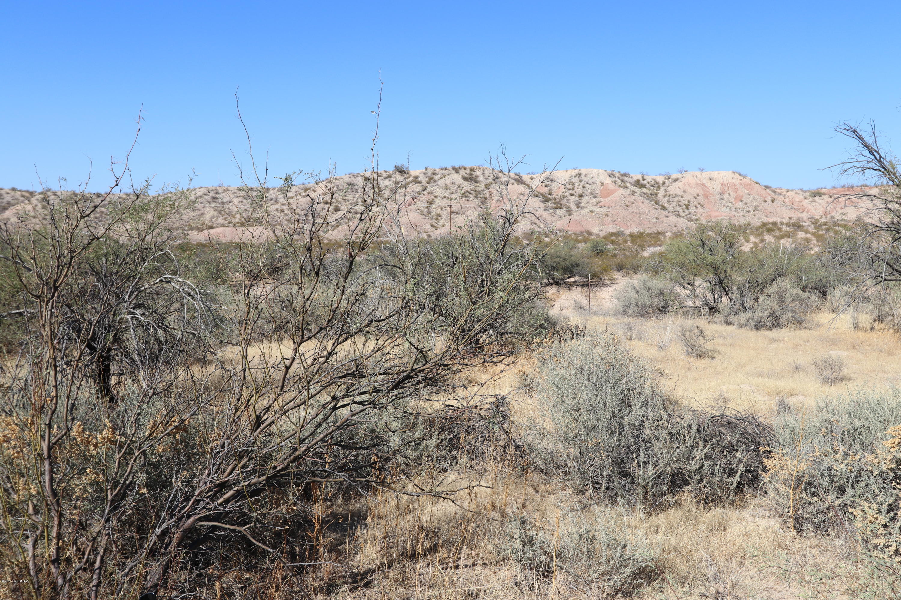 Scenic lot near Benson, AZ. This is a perfect lot for your dream home. Country living 15 minutes from Benson, 30 minutes to Tucson. Mountain Views, mild climate. Enjoy nearby rodeos, festivals and wine tasting in the heart of Cochise County Arizona. Hike, bike, camp and hunt. Enjoy nearby historic Tombstone and Bisbee. The property is just a short ride to Karchner caverns.
