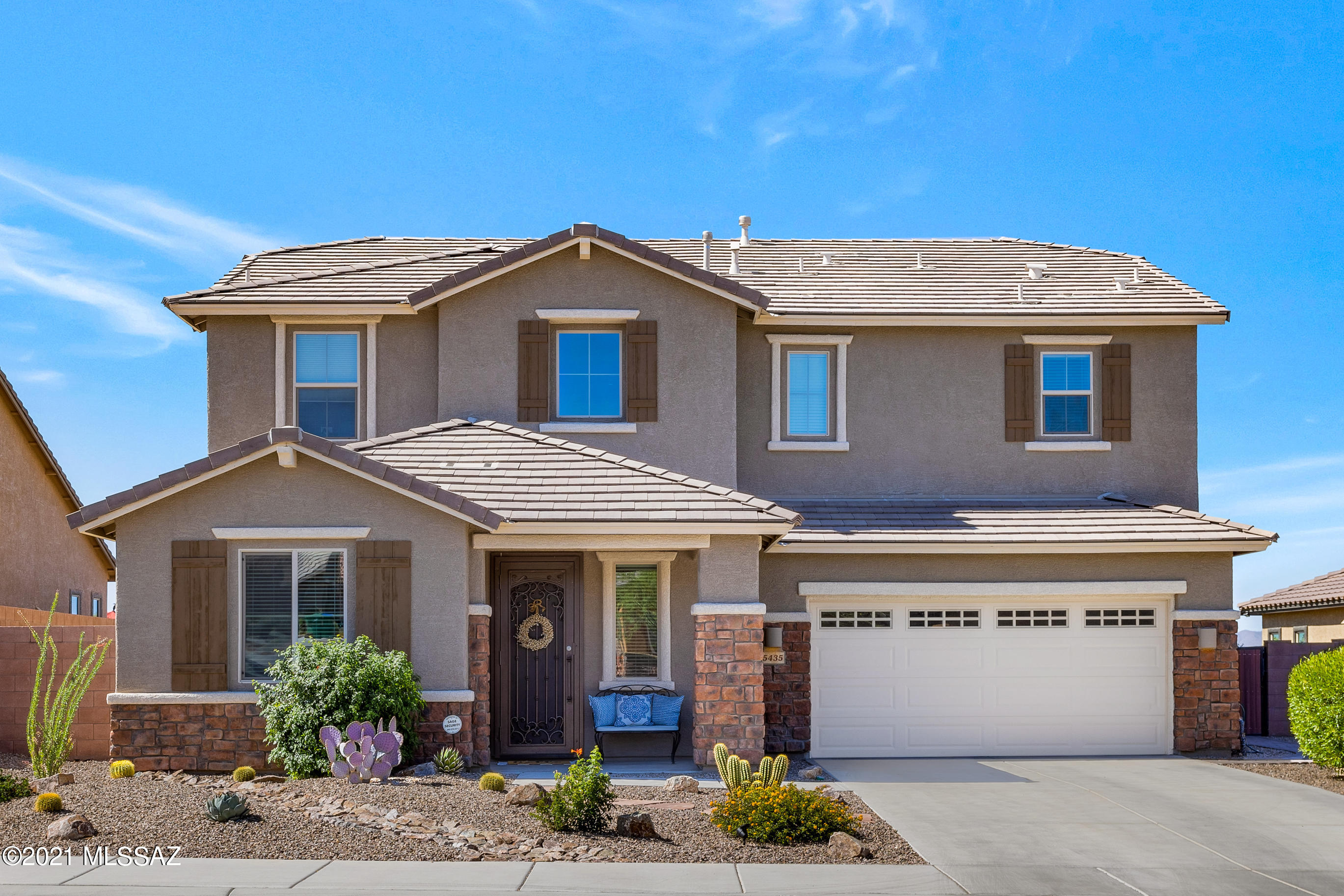 Don't wait one second to view this gorgeous 2 story home in the prestigious Dove Mountain area. With 4 bedrooms, 3 full baths, spacious living room and family room off the kitchen and large upstairs loft, there is plenty of room to spread out and enjoy the beautiful views from the large windows throughout the home. There is one guest room downstairs adjacent to the shared downstairs bath. This home has high ceilings and a wide open entry inviting your guests to come inside. 
You'll spend hours in this beautifully manicured backyard, built in BBQ and crystal clear pool.
Schedule your showing now before it's gone!
