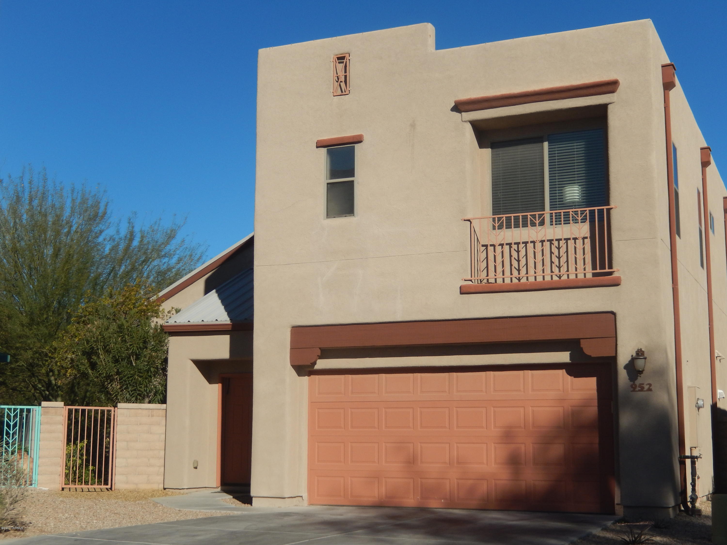 Financing fell apart and now back on the market. Very clean and nestled in a gated community at the base of A-Mountain. This two story, 3 bedroom 2-1/2 bath home is just minutes from downtown with easy access to Interstate-10. The only small private gated subdivision in the area offers an exclusive lifestyle not afforded by many in the area. The homesites are small and designed for a very low maintenance and active lifestyle for homeowners. Homes in Paseo Estrella do not come on the market very often and when they do, they sells fast. Call now for your exclusive showing.