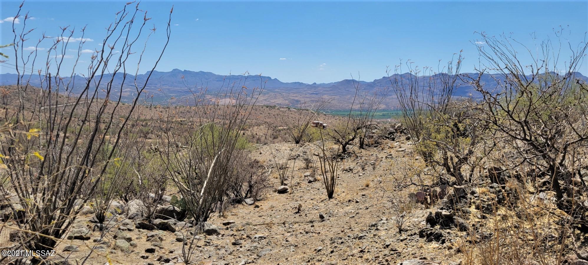 Great View lot on on Via San Cayetano which was recently chipped sealed.  Minutes to the freeway and few neighbors.  Good building site and a ton of big boulders for landscaping later.