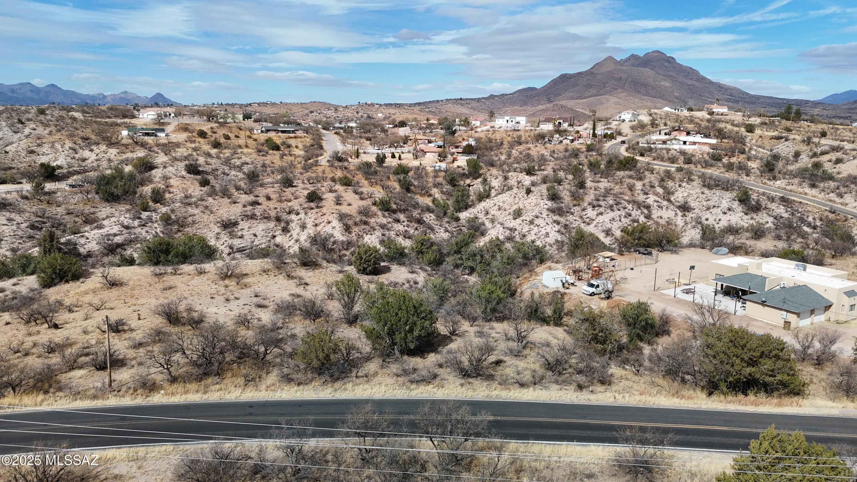 Rolling terrain, all paved access.