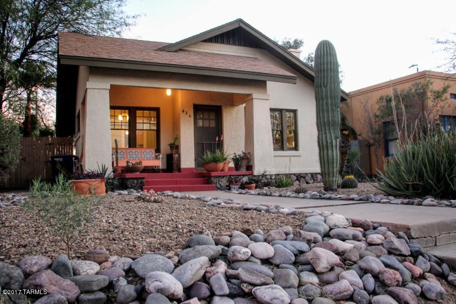 **We have an accepted offer and several in backup.  No more showings.**  Simply adorable 1923 bungalow with an inviting front porch, and a studio guesthouse in historic Feldmans neighborhood! This is the kind of charm you're looking for, with original built-ins, fireplace, wood floors, gorgeous kitchen, and fully walled backyard with huge trees and mature foliage.  Add to that a studio GH (probably unpermitted conversion) rented at $550, at the rear of the most darling shady private yard and gardens you dream of!  Studio has bath and kitchenette, but would also make an amazing art studio!  Water harvesting, custom brickwork, fruit trees. This is the one you've been waiting for!