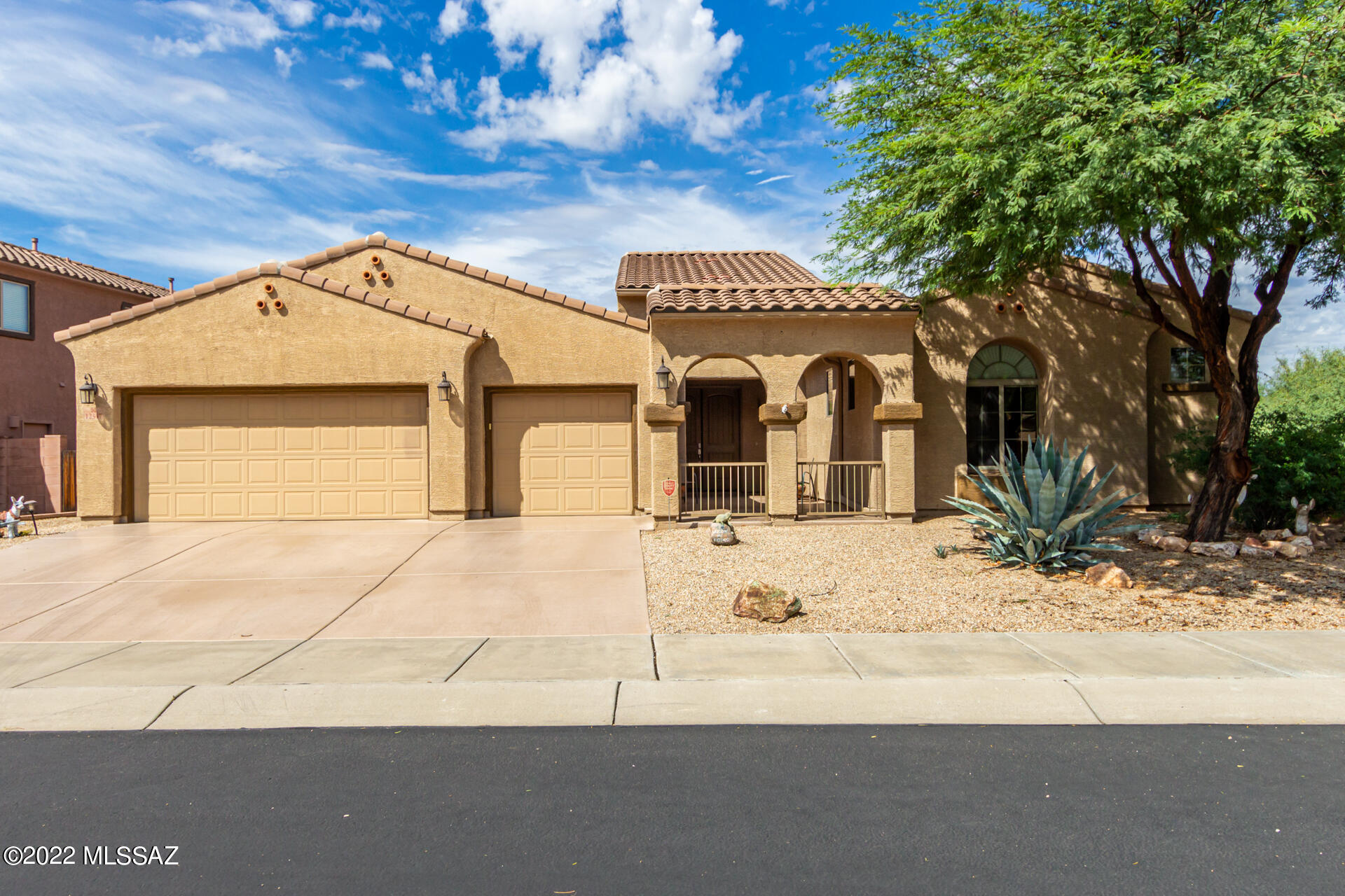 This gorgeous 4-bedroom corner lot property in Tangerine Crossing is the one! A spacious 3-car garage will greet you upon arrival. Come inside the entry hall to discover a bright & airy living area featuring tile floor, neutral palette with fresh paint , soft carpet, & high-vaulted ceilings. Pass the archway to find the fabulous family rm with a cozy fireplace! The spotless eat-in kitchen boasts plenty of wood cabinets, granite counters, SS appliances, recessed lighting, a pantry, & an island w/a breakfast bar. Double doors open to the sizable main suite offering an impressive bay window, a private bathroom w/dual sinks, & a walk-in closet. Enjoy mesmerizing mountain views from the wonderful backyard w/covered patio & easy-care landscape! Don't let this home pass you by.