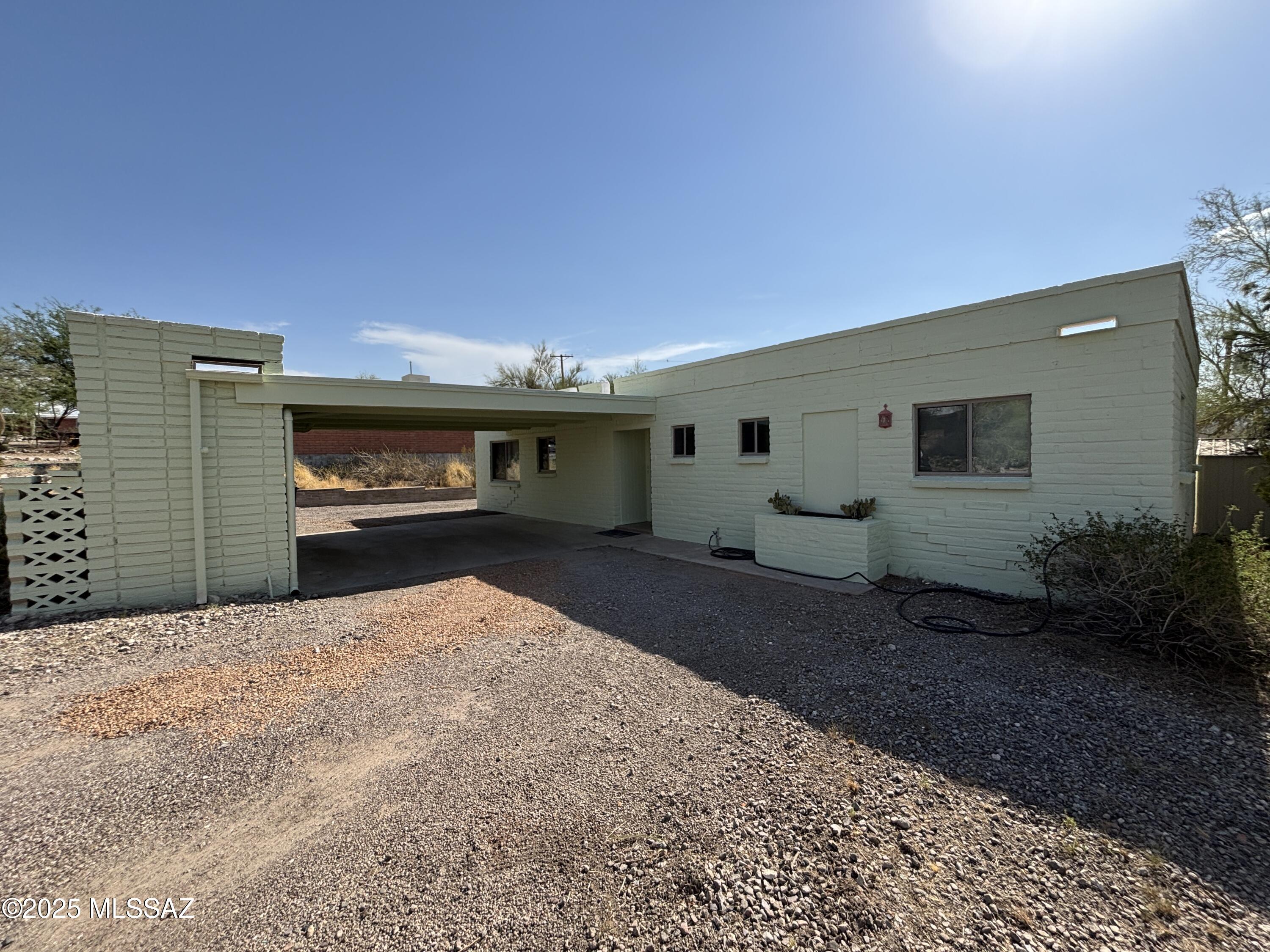 Great, 3 bed 2 bath home within walking distance to Pima College West Campus. House has been redone and is ready for move in. The home has polished concrete floors, A/C and includes brand new kitchen appliances. The house has a large walled backyard and also comes with a washer and dryer. Pets are negotiable with a $500 refundable pet deposit and a $35 monthly pet rent.