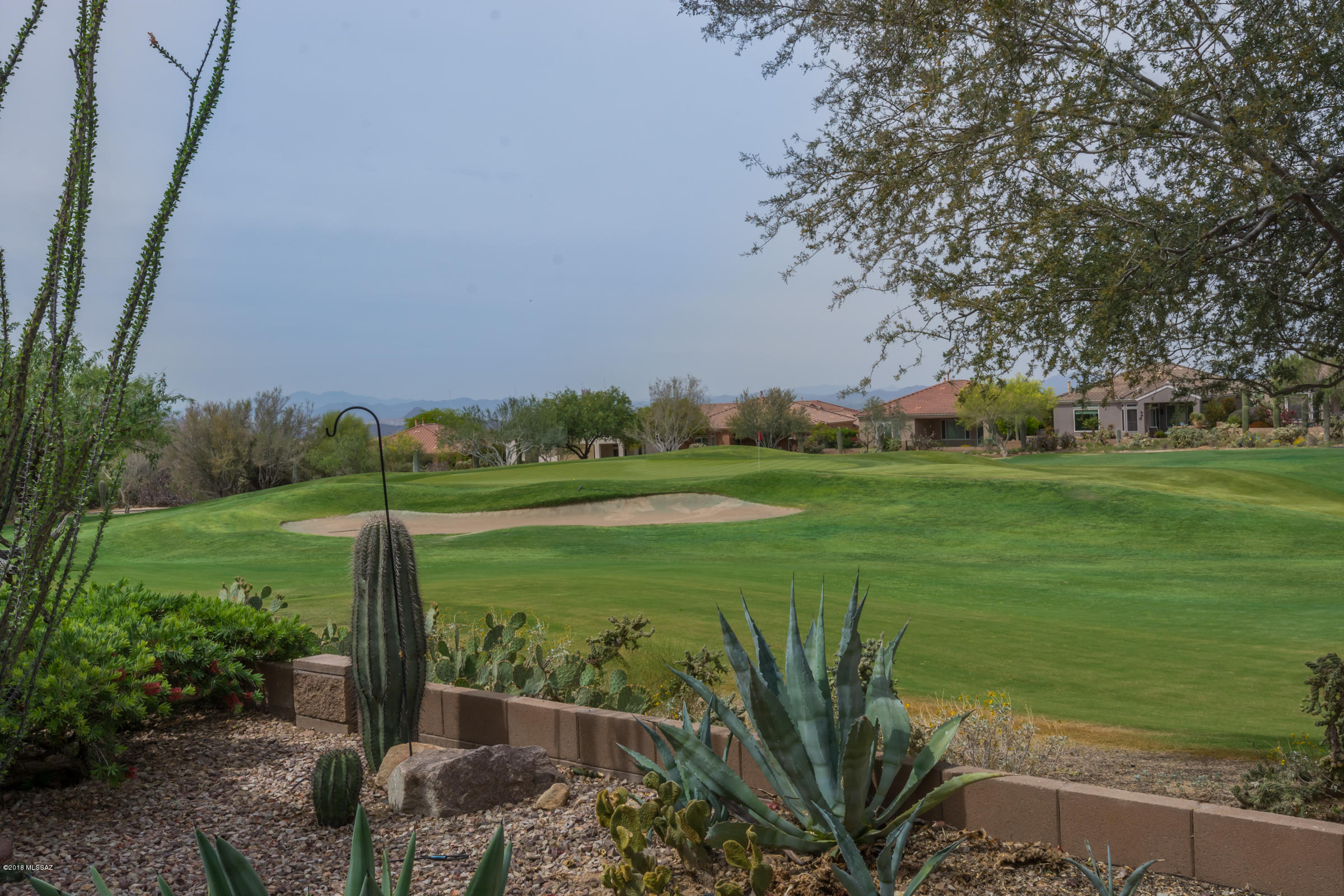 FELL OUT OF ESCROW. The Highlands-50+ gated community. Enjoy sunsets and golf course views. Located on the 4th hole, NO cart path. This 2 bedroom-2 bath (1832+-sq. ft.) split plan offers greatroom living. Includes cozy family, living and dining room spaces.  Maple kitchen cabinets with plenty of counter space, pantry and gas stove. Inside laundry room with cabinets and office space. Spacious Master suite offers dual sinks, soaking tub and walk in shower. 2 car extended garage. The Highlands offers community center, restaurant, exercise facilities,pool table,craft rooms,library,pool,spa,tennis,pickleball and golf. Call for private showing.