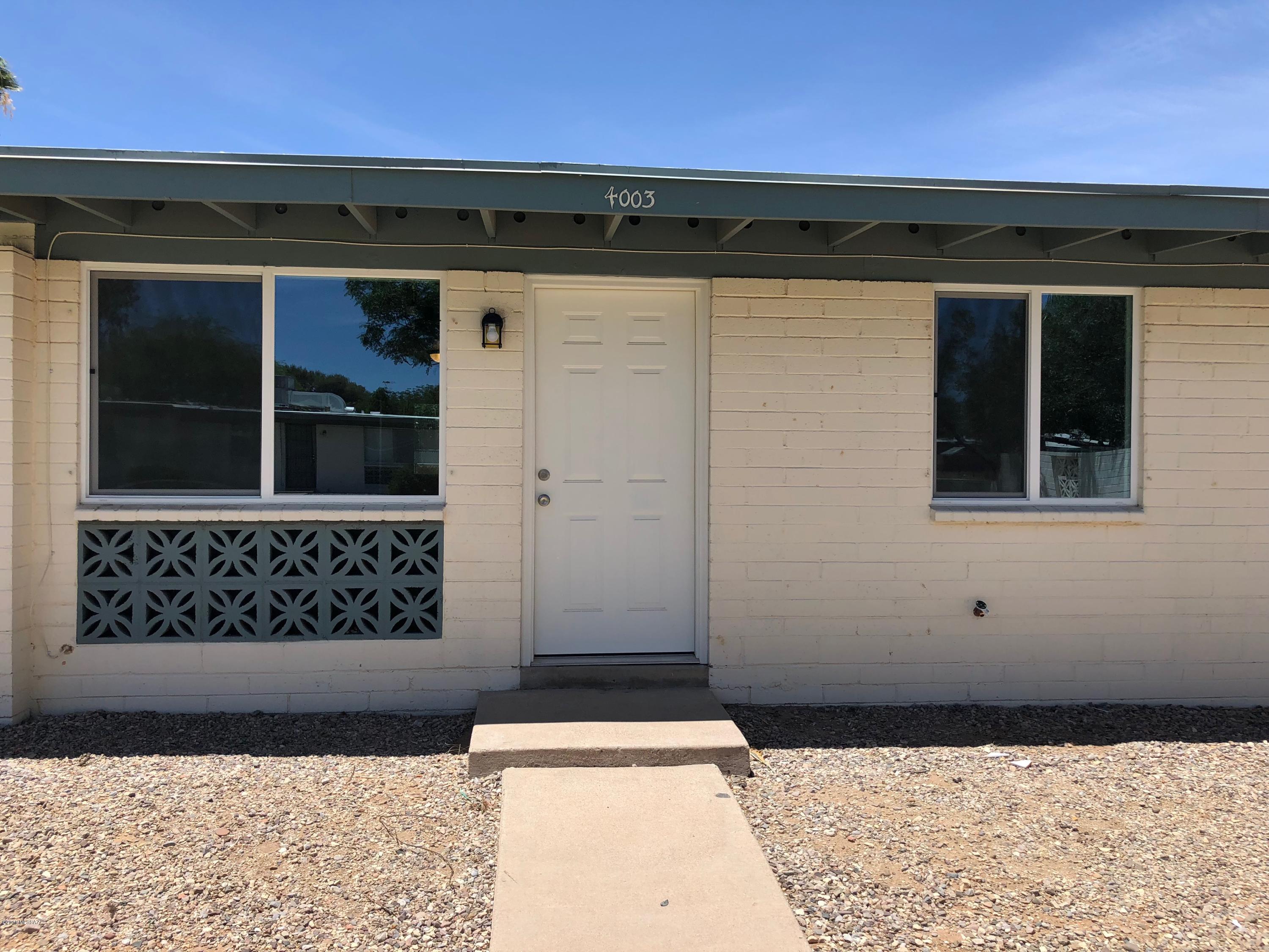 MLS ENTRY ONLY. Newly remodeled 3 bedroom/2 bathroom end unit townhouse with AC, new appliances, private backyard, carport, tile in common areas and new carpet in bedrooms is ready for immediate occupancy. Call owner today for an easy show!! 520-721-6890.