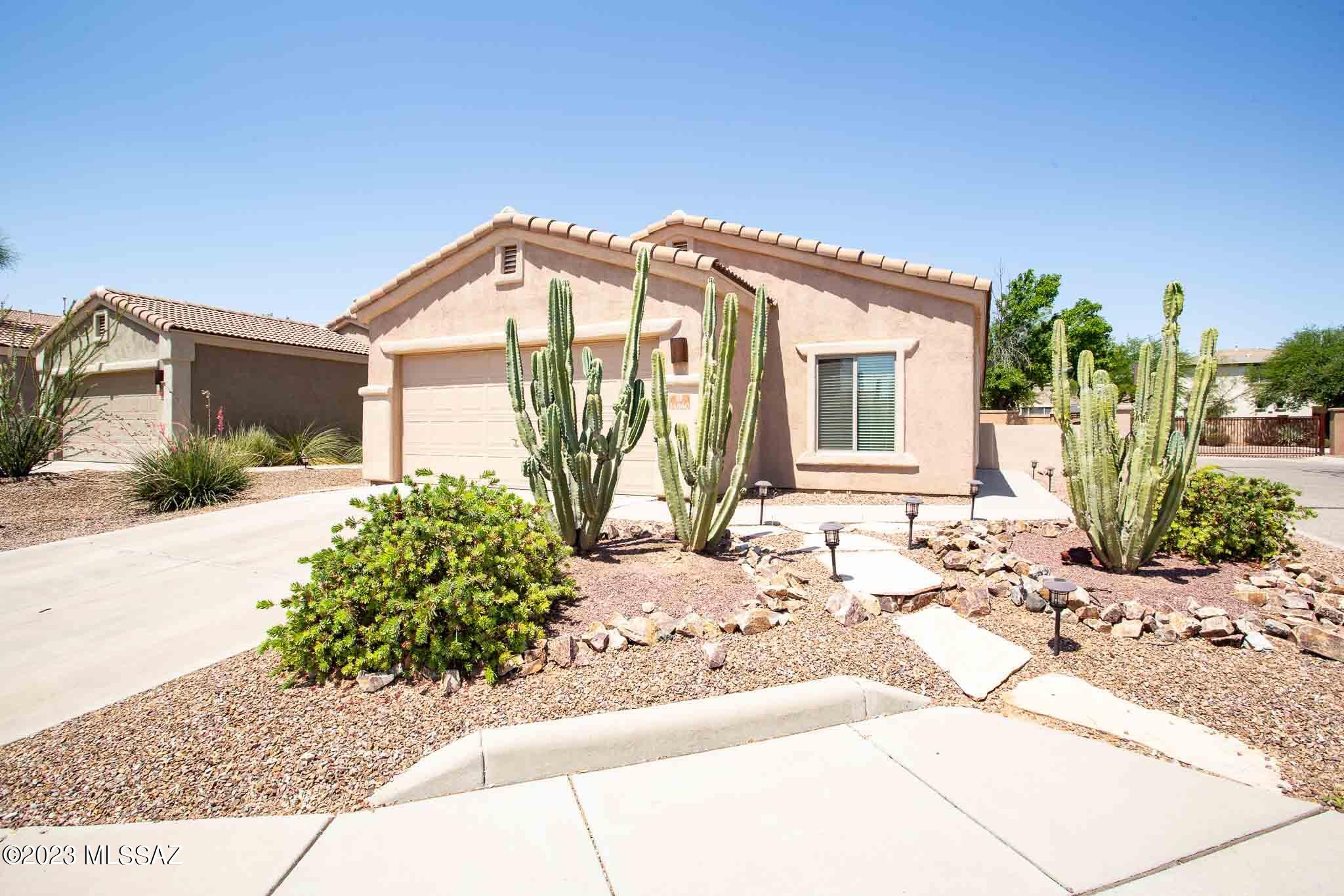 Beautiful home located in the popular community of Rancho Sahuarita with community pools, splash pad, clubhouse, parks, trails & much more! This home has 3 bedrooms, 2 bathrooms, den, 2 car garage, laundry room & backyard with covered patio, pavers & artificial grass great for entertaining. Spacious kitchen with plenty of cabinet space, pantry closet, stainless steel appliances, breakfast bar & dining area. Located on corner lot close to shopping, restaurants, schools and much more! Come see this home today!