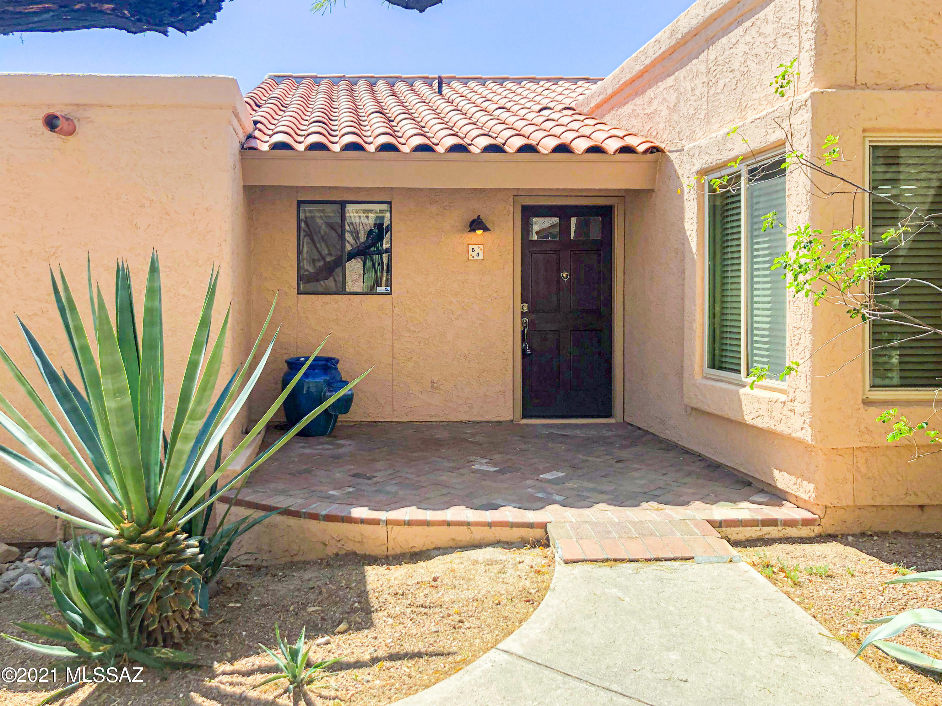 Guard Gated! Private! Quiet 2br + 2ba Villa in desirable Sin Vacas! Mountain views all around! Vaulted ceilings with a split floor plan for privacy. Hardwood flooring throughout with new carpet in bedrooms and a decorative wood burning fireplace in living room Dark stained kitchen cabinets. Breakfast bar. Washer, dryer,  refrigerator, microwave, stove, and dishwasher all included! Water and Trash also included! Back patio opens to natural landscaping and wildlife! Community includes a heated pool, spa, fitness center, and clubhouse! Enjoy the desert everyday! This home is available immediately. The rental rate is $1,595.00 per month and the security deposit is $1,695.00. If pets are allowed and approved, there is a $25.00 monthly pet fee per pet, plus a $150 non-refundable pet fee, per pet. Pets are subject to owner approval.  2 pets under 35lbs ok.

Our residents are automatically enrolled in our Resident Benefit Package.  The cost of this program is $29 per month. For more information regarding this program, please go to www.bluefoxproperties.com to the "For Residents" tab on the banner and click on the Resident Benefit Package on the drop down menu.

Every adult age 18 and over must complete an application. The application fee is $55 per adult. The application process includes credit, criminal, previous rental history, employment and income verification.

Our minimum rental requirements include the following:
1.The applicants' household verifiable gross monthly income must be 3 times the rental rate. If you are concerned about insufficient income, you may be able to address this concern by adding a cosigner or offering additional security deposit. Contact us for details.
2.All our homes are offered as non-smoking. No smoking is allowed on the premises, inside or outside the home.
3.Reasonable credit. If you are concerned about challenged credit, you may be able to address this concern by adding a cosigner or offering additional security deposit. Contact us for details.
4.We do not accept Section 8.
5.Applicant to provide proof that debts to previous landlords have been satisfied. An eviction can be grounds for denial.
6.No felonies for the past 10 years related to property damage, illegal substance manufacturing or distribution, or assault. Other criminal activity may be grounds for denial.
7.All pets are subject to approval.
8.No bankruptcies that have not already been discharged.
9. All current or pending collection accounts owed to any utility companies must be paid in full, with no exception and must provide a receipt from the collection agency or utility company stating the collection fee has been paid or settled.
10. You must fill out an application on www.bluefoxproperties.com. Applications submitted through any other site will not be accepted and Blue Fox will not be responsible for any refunds.

Blue Fox Properties is an Equal Opportunity Housing provider. We are also licensed REALTORS.