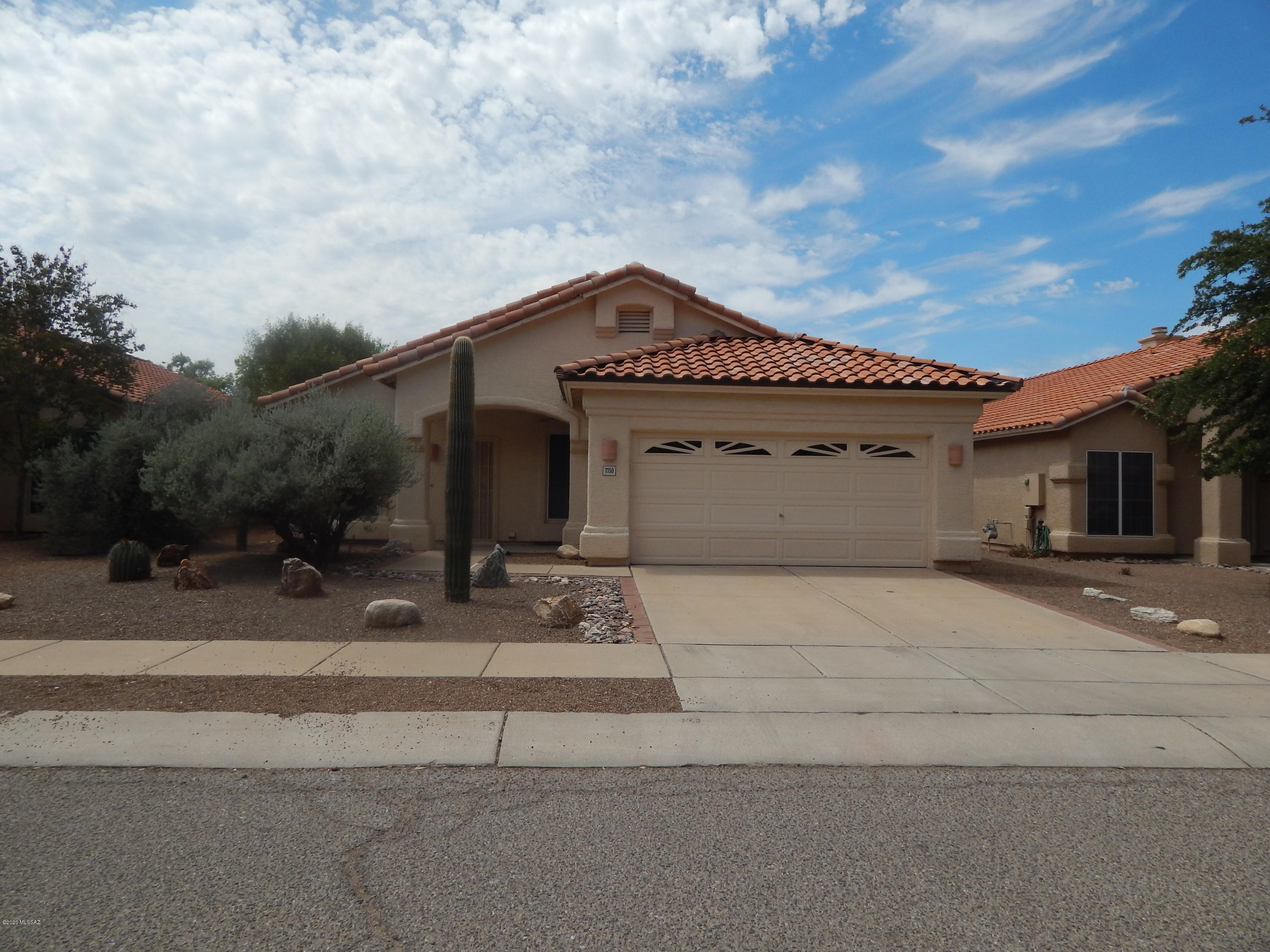 Great 3 Bedrooms in Foothills.  One Block West of Sabino Canyon Rd.  This home is ready for occupancy on 7/31.  3 bedrooms all with ceiling fans.  Living Room and Dining Room plus a great room with gas fireplace that is open to kitchen.  Kitchen has eat-in area PLUS a breakfast bar area.  Two bathrooms, Master bathroom has separate tub/shower and huge walk-in closet.  Two guest bedrooms on other side of house -.  Central AC and Heat.  2 car garage.  Garage door is insulated to help with the AZ Summers.  Laundry room is plumbed for a gas or electric dryer.  Carpets and Interior cleaning and santizing in process of being done. Please wear mask when entering the property.