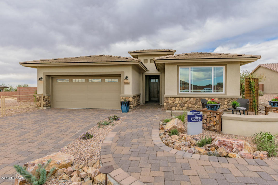 Highly desired Sycamore model Mattamy Home.  This home is the ACTUAL home that is for sale with a lucrative leaseback opportunity to make $2,625 per month leasing back to the home builder. The home boasts over $160,000 in high end upgrades. Enjoy the large open Great room/Dining area which serves as the hub of this beautiful home with access to back patio, master suite & an open kitchen. The gourmet kitchen features an amazingly long central island with a sink & dishwasher, 5-burner gas cooktop, granite counters, tiles backsplash, stylish hood/vent, under-cab lighting, generous cabinet & countertop space, as well as walk-in pantry. The split-bedroom plan features a  luxurious bathroom w cultured marble counters, a classy tiled walk-in shower, dual sinks & a huge master closet, an Enclosed den/office with glass French doors provides a quiet sanctuary or can be converted to an additional bedroom.   Additional amenities include a stop-n-drop area off of the garage entrance, a linen station, storage cabinets & a utility sink at the laundry, kitchen pendant lights, gas BBQ stub-out, a complete in-home prewire fully equipped with audio surround, wifi remote thermostats.  The home has been given an elegant custom duotone paint job, can lights throughout the entire home, accent tiled walls, oversized hallways, custom high-end window treatments, gorgeous cabinetry accented with tasteful crown molding.  The backyard was completely landscaped with a serene fountain, an upgraded travertine patio, and over-sized planters. The home sits on one of the larger oversized lots with unobstructed incredible mountain views.  The front yard has inviting curb appeal with a landscaped sitting area and a driveway and front entry lined with beautiful pavers. This home is a Mattamy model home and can be previewed every single day.  Don't miss the opportunity to own this dream home and incredible investment opportunity.