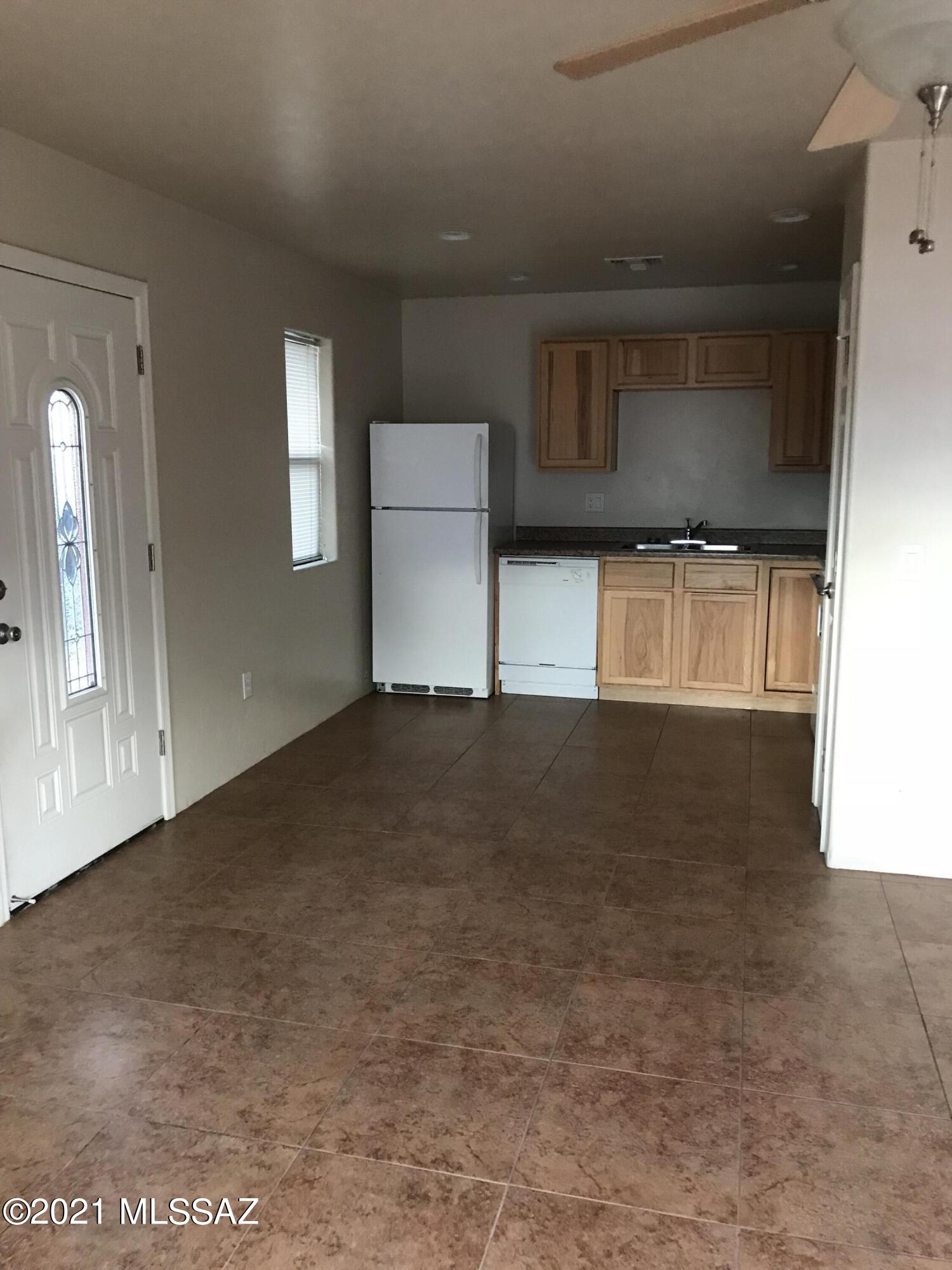 2 Bedroom 1 Bath Stack washer & Dryer Included. Rear Yard Fenced and parking next to unit. Central AC Tenant pays all utilities.