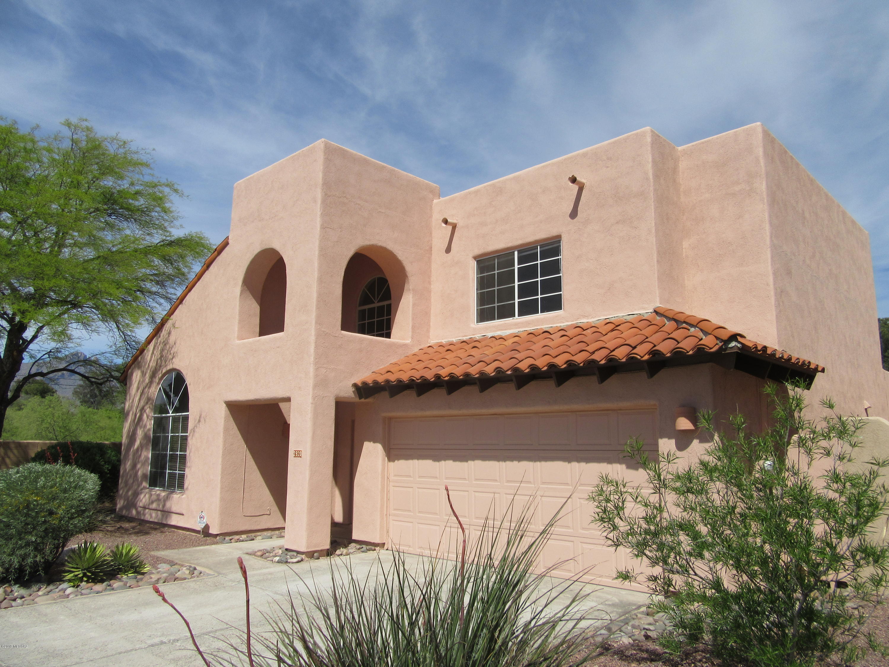 Newly Renovated 2Story 4br/3ba in Desirable Midtown, Close to Tucson Racquet Club/Jogging Paths/Rillito River Park! Designer Inspired Wood Laminate Flooring Throughout, New Carpet, Neutral Fresh Paint and Ready for Immediate Occupancy! Soaring Vaulted Ceilings, Formal Living/Dinning Area, Great Room with Cozy Fireplace, Private Balcony off Master with Mountain Views! 3 Br's Upstairs, and One Located Downstairs for Mother-in-Law or Office. Quaint Community Built by AF Sterling located in Park-Like Setting and Close to Everything! Don't Miss the Remodeled Gem in the Heart of Tucson!  Call Agent for Additional Details!!!