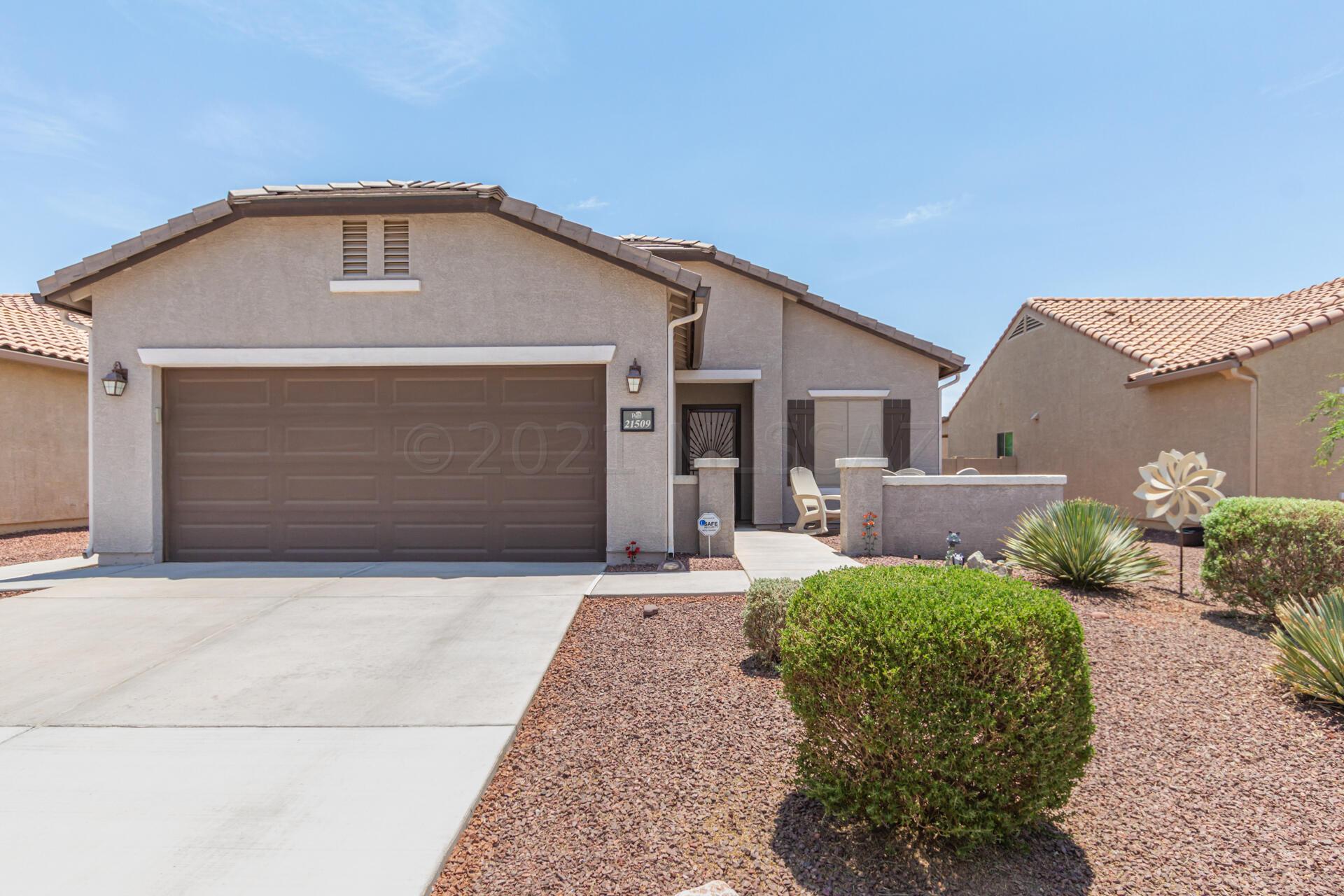 AMAZING single-story home with 2-car extended garage with extra outlets and lights, beautiful easy-care landscape, & an impressive courtyard entry. Open floor plan,  neutral palette, recessed lighting, ceiling fans, and carpet in all the right places! Stunning eat-in kitchen features handsome wood cabinetry, pantry,  stylish backsplash, essential appliances and a breakfast bar. The primary retreat has a private bath with dual sinks, large shower, and a walk-in closet. The covered Arizona Room is perfect for afternoon relaxations. Room for a pool!  SunRun Solar lease $115/month. Make this gem yours, call now! ALL furniture is available on a separate bill of sale!