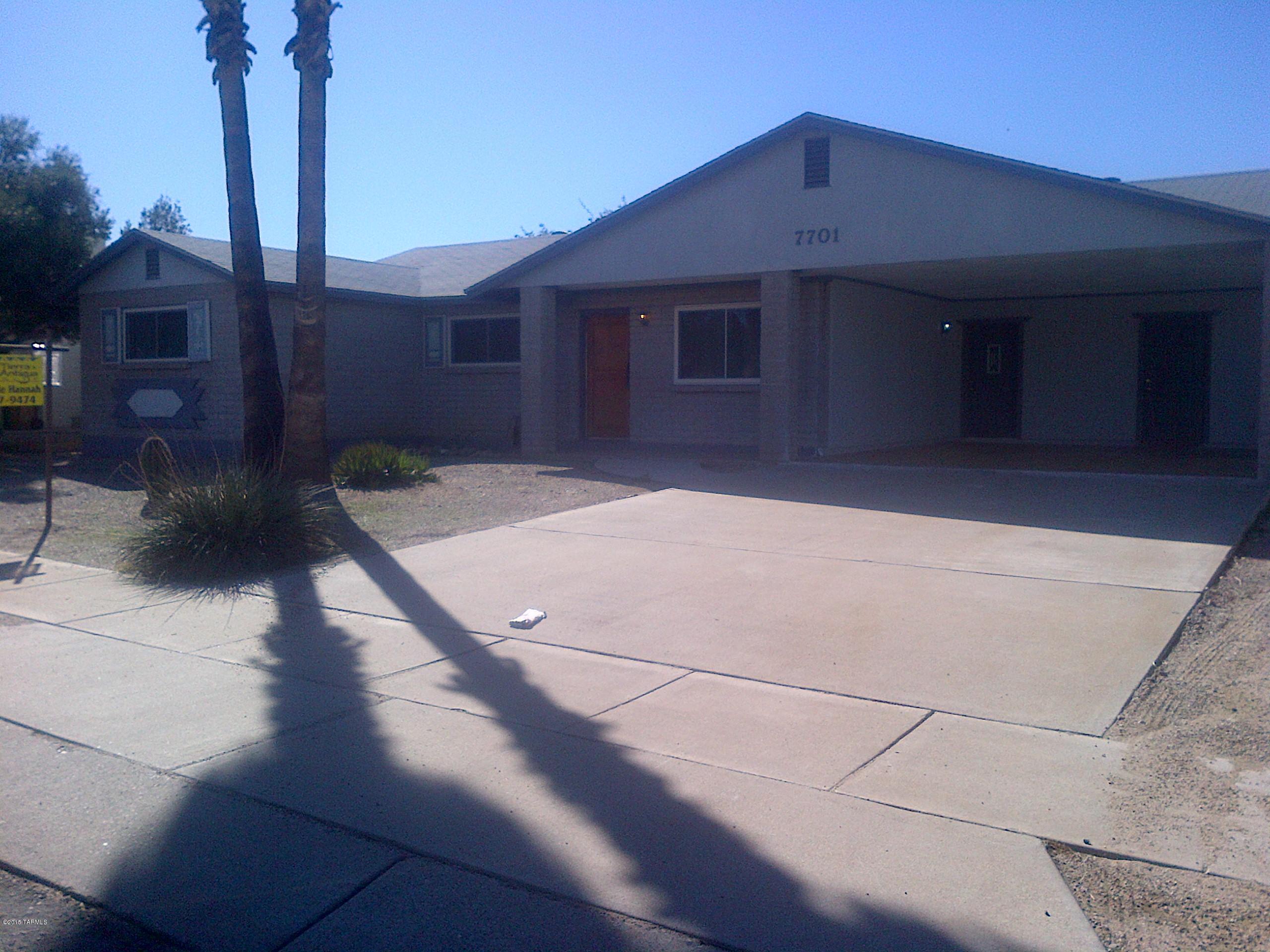 This home has a huge fenced in back yard with an extended covered patio.  Perfect to store all of your toys-RV, boat or put in a swimming pool. Gated side entrance to back yard has additional room for a trailer or boat. Spacious 4 bedrooms with greatroom floor plan. Open kitchen with gas stove and updated cabinets has a large eat in area. Master has walk in closet, ceiling fan and a walk in shower. Guest bath has tub and linen closet. Ceiling fans in 3 bedrooms and lots of unique touches and niches. Dual pane windows.  Separate laundry room with washer and dryer and built in cabinets.   Large storage/workshop with light & power. Backs up to wash area.  Convenient NW location.