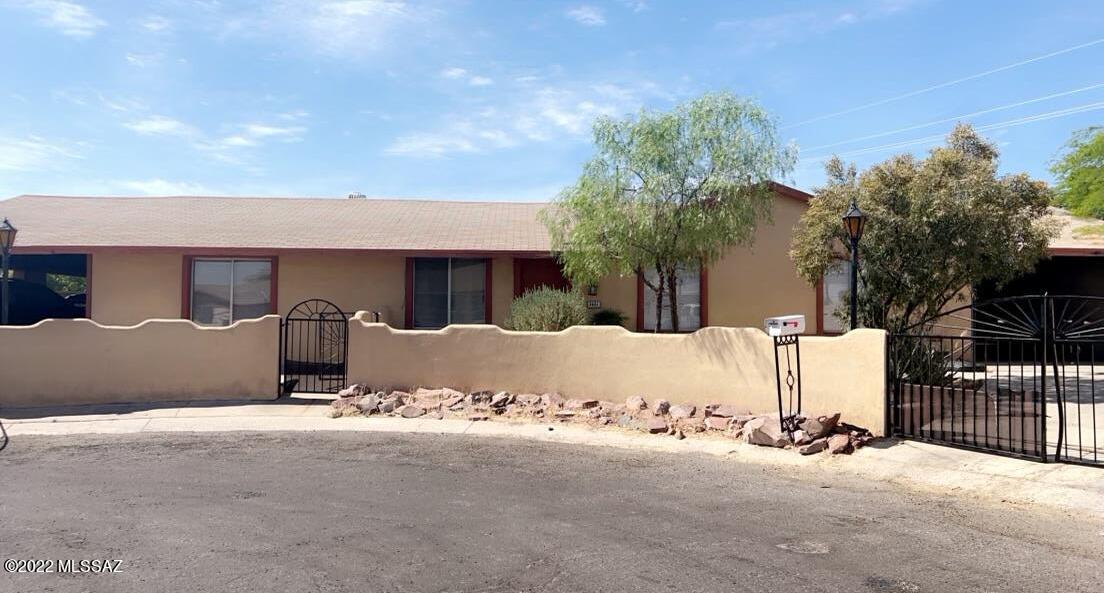 Beautiful 3 bed / 2 bath home n a cul-da-sec with newer HVAC (4 years old) All appliances stay with this property. 2 carports with wrought iron gate and wall at front entrance.Property includes termite treatment with 1 year warranty. No HOA!