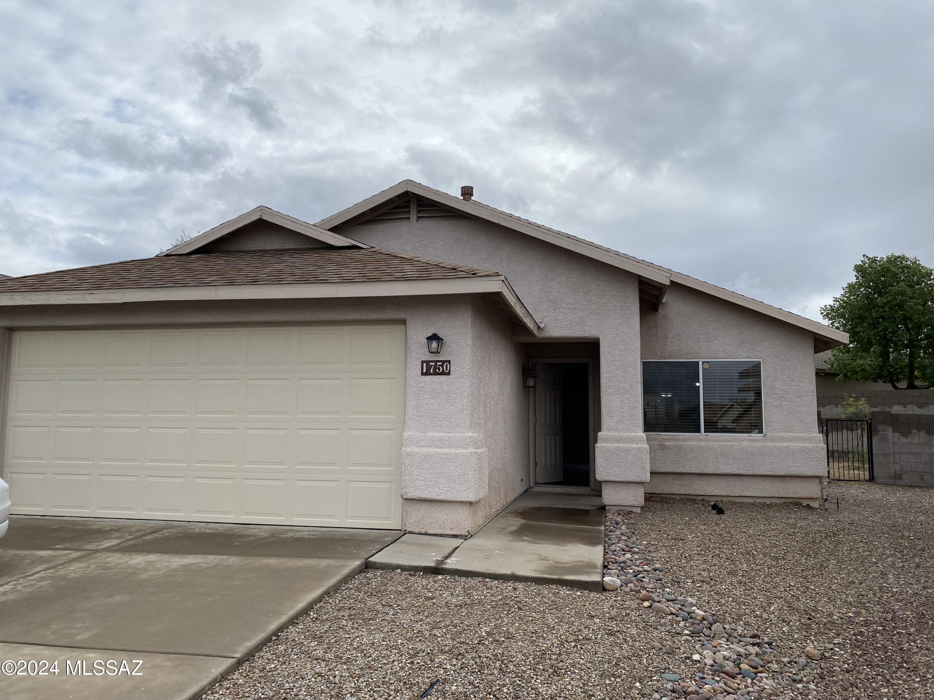 Absolutely Gorgeous Wood Flooring in this very comfortable 3 Br 2 Ba home with all appliances  Central AC. Large Block walled rear yard,. Covered patio and 2 car garage. Great neighborhood super location, across from Silverlake Park (w/public Library and sports fields.). Easy access to major commercial, medical centers Banner UMC VA Medical,  and Kino Sports Complex. North of Tucson Market Place.