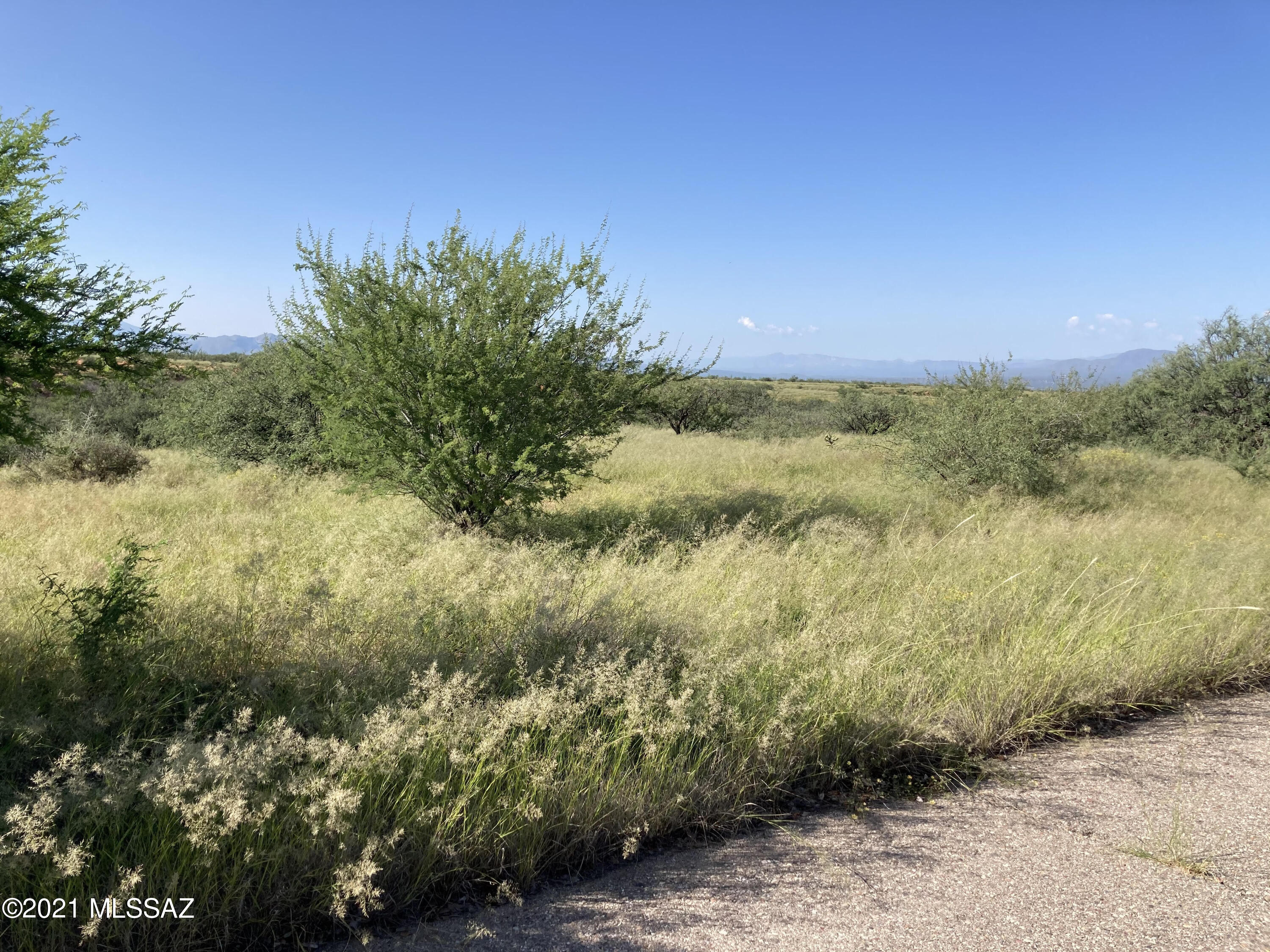 Be the next custom home in Cottonwood Highlands - under ground infrastructure in and waiting for your contractor -   Gated entry, paved roads, natural landscaping, mountain and sunset views, fresh air - easy drive to Sierra Vista, Benson and Tombstone.  Building has begun in Cottonwood Highlands
