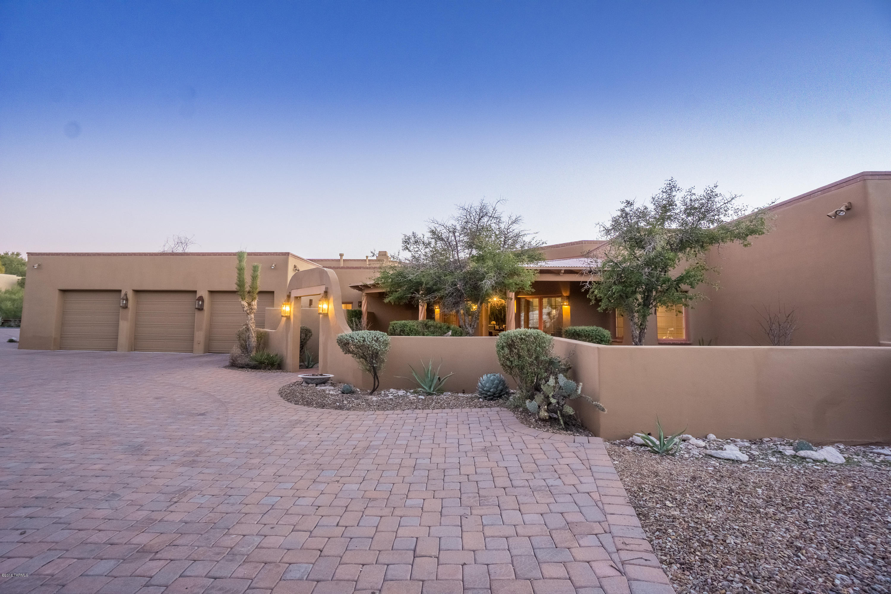 Beautiful Hacienda Style home in the coveted gated community of Hacienda Del Sol Estates. Brick paved driveway which leads to a charming front courtyard. Over sized 3 car garage with plenty of room for storage. Gourmet kitchen with granite counter tops, large center island, and huge pantry. South facing back yard with Full wrap around back patio. Newly painted interior home.