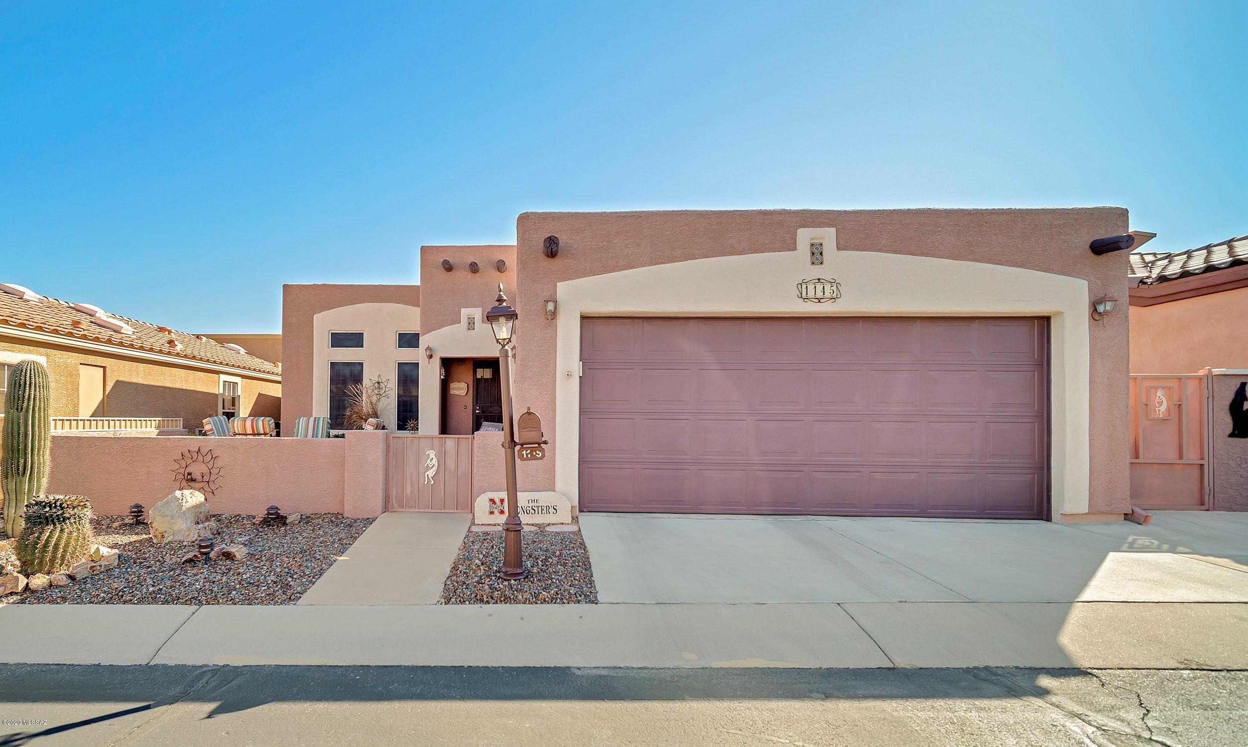 You will love this, well maintained prior model home.  It's located in the sought after gated active adult community of Rancho Resort.  This cozy 2 bedroom and 2 bath home features an open floor plan with beautiful kitchen and granite counter tops and stainless-steel appliances including a gas range.  It has engineered wood flooring with tile in the right locations.   For your outdoor comfort it features a private screened in patio and a courtyard.   The 2-car garage is heated and cooled with epoxy flooring.  This home is a short distance to park and recreation facilities.