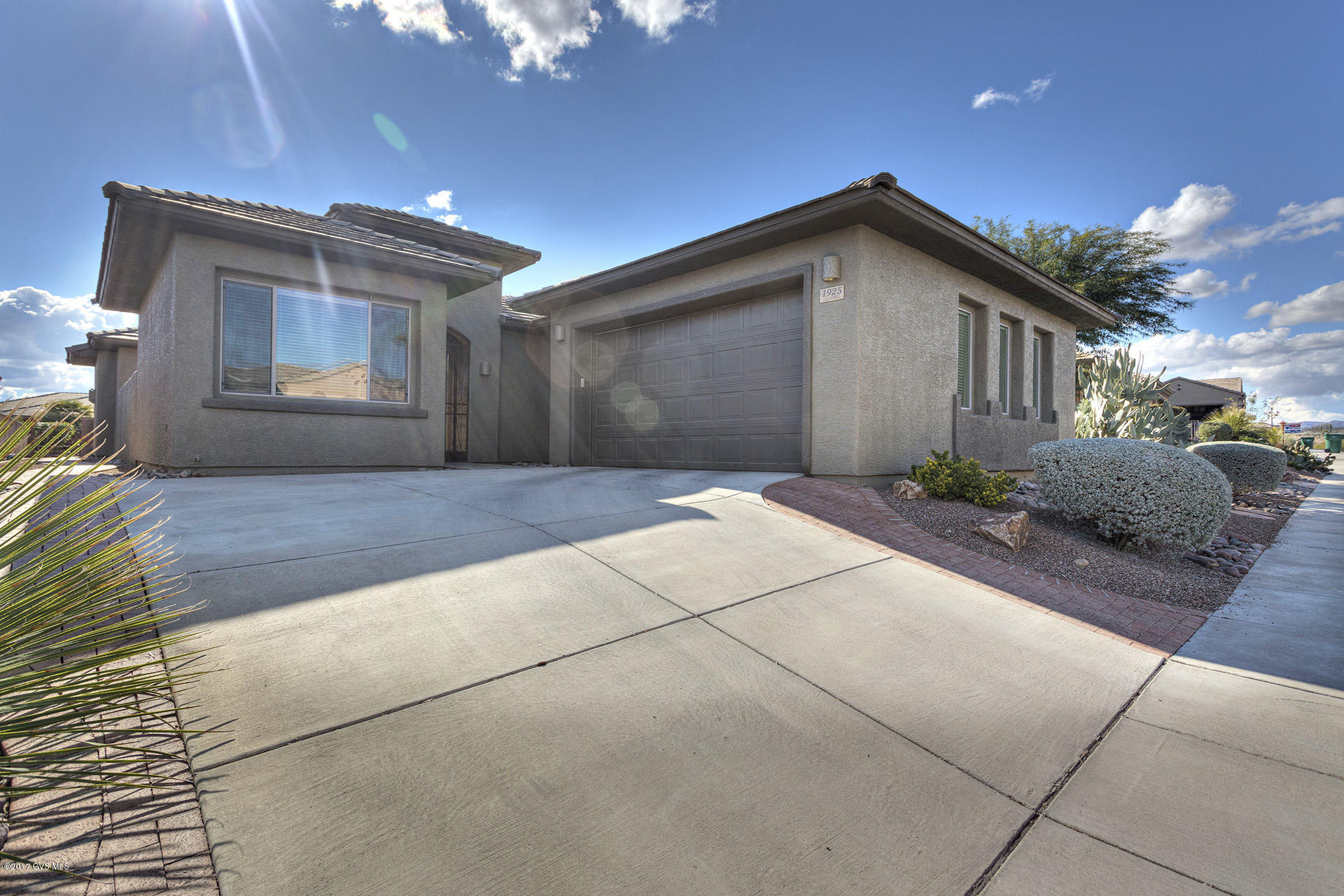 You'll love this most popular Valle floor plan along with the added 220sqft Bonus Room in a gated community in Canoa Ranch. This home has it all including great views of the Santa Rita mountain range. An open floor plan awaits you with split bedrooms, den/office, laundry room, french doors that open to the private courtyard, circular foyer and much more. The kitchen area includes a granite breakfast bar, dining nook, and plenty of storage. Turn your Bonus Room into something special - make it an office, man-cave, recreation room, guest room or your own private getaway.
 
 Close to Green Valley Recreation facilities, golf, shopping, and dining. You'll enjoy everything Green Valley has to offer and this is a true MUST SEE!