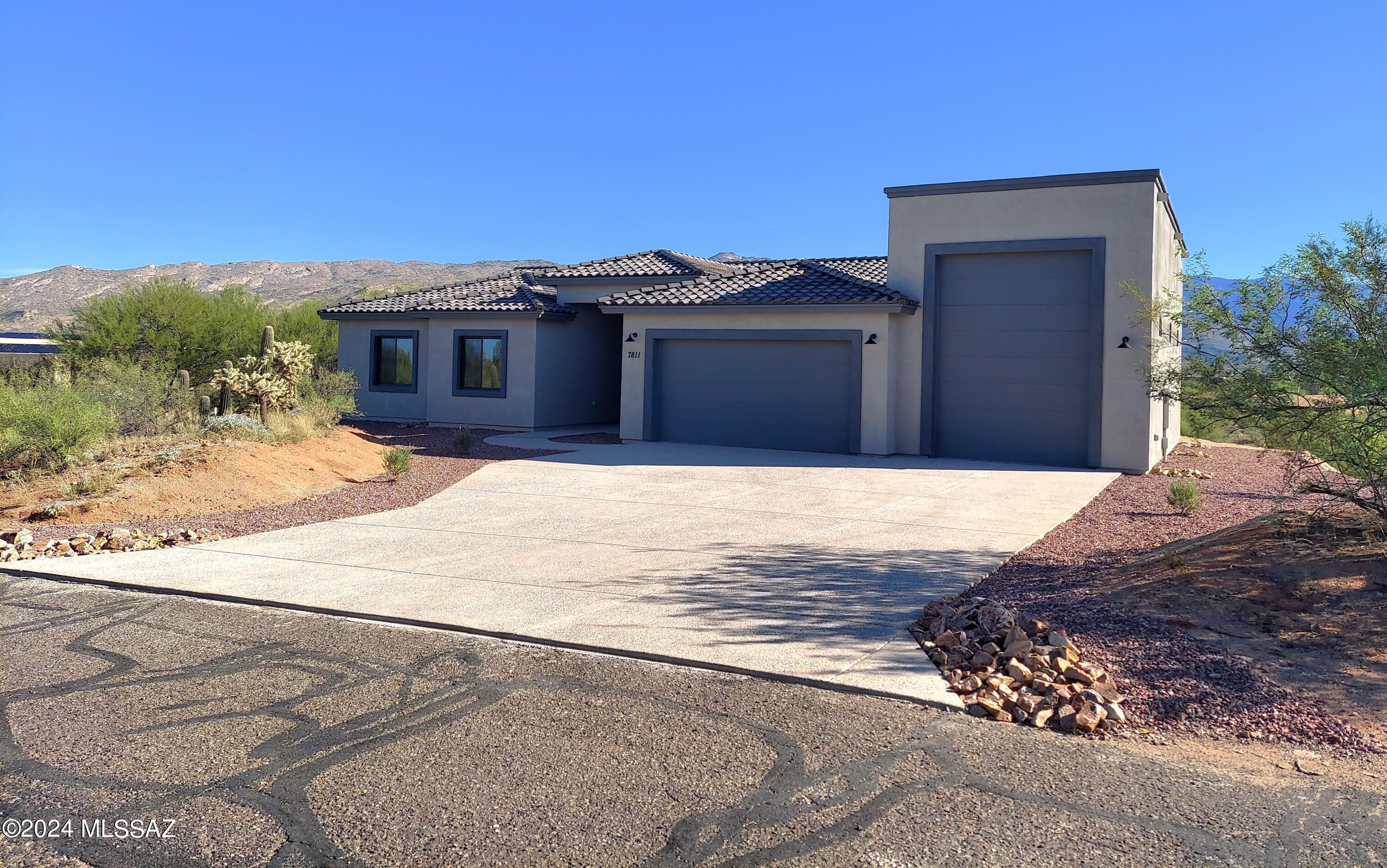 New Beautiful Custom Home with Panoramic Views. Amazing Location and Neighborhood.  Open design Functional Floor Plan, with high ceilings and wall of windows perfect use of space. Home includes 3 bedrooms with a Den, 2 Full Bath, & 1/2 Bath. Includes  Mud Room/Drop Zone. Gorgeous Kitchen With all New Samsung appliance package, Quartz Counter tops and Island. Beautiful Cabinets with full extension drawers and soft close hinges, and under cabinet lighting. Spacious walk in Kitchen panty. Impressive Master Suite with Double Vanity and Huge Walk-in-shower for 2, with access to full length porch.  Over 1,000 sq ft of Garage Space, Garage is equipped with 50 AMP receptacle. bring your toys and RV. Located on just over an Acre, with easy care landscaping. Quality Built energy efficient Home.