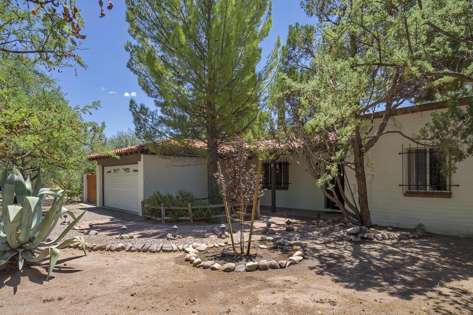 A beautiful A.C. Ray home on nearly an acre to give you lots of privacy and room to play! Home has 1831 SF with 3 bedrooms and 2 baths. In addition to the formal living room and dining room area, the AZ room provides plenty of space for entertaining or just relaxing. There is also plenty of room for activities in this fully walled in  yard. This home is also has it's own well, which means no need for the city water. Another great place for relaxing is around the beautiful pool and patio area!