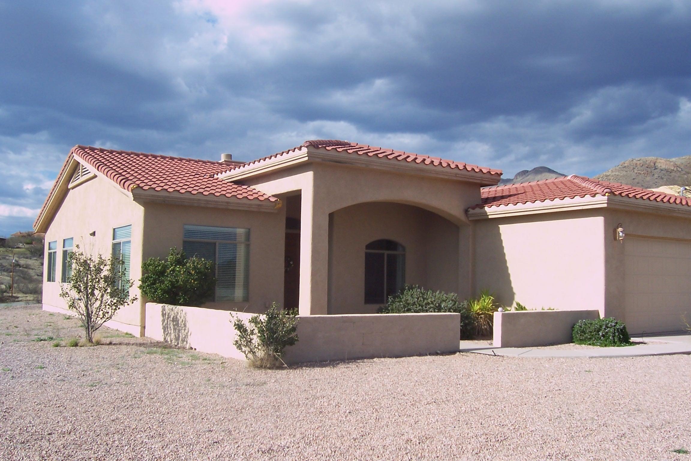 Beautiful quiet three bedroom home, 2 1/2 baths, open floor plan, large windows with plenty of sunlight, high ceilings, large  covered patio, plenty of closet space, nice spacious bathrooms, double sinks in both bathrooms, great corner lot. Beautiful mountain and valley views.