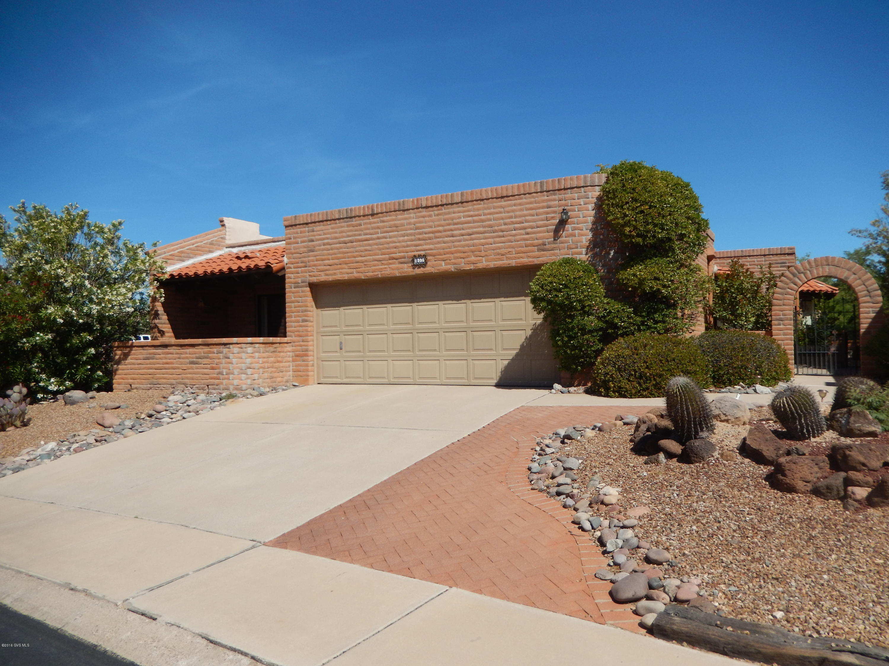 Perfectly situated next to the Desert Hills golf course with views of the course and some mountains. Gas beehive fireplace in the living room and one in the master bedroom. Some tile and laminate flooring. Wet bar, skylights, garage cabinets, workbench, and central vacuum. Walk-in tub plus shower in the master bath. Furnishings available.
