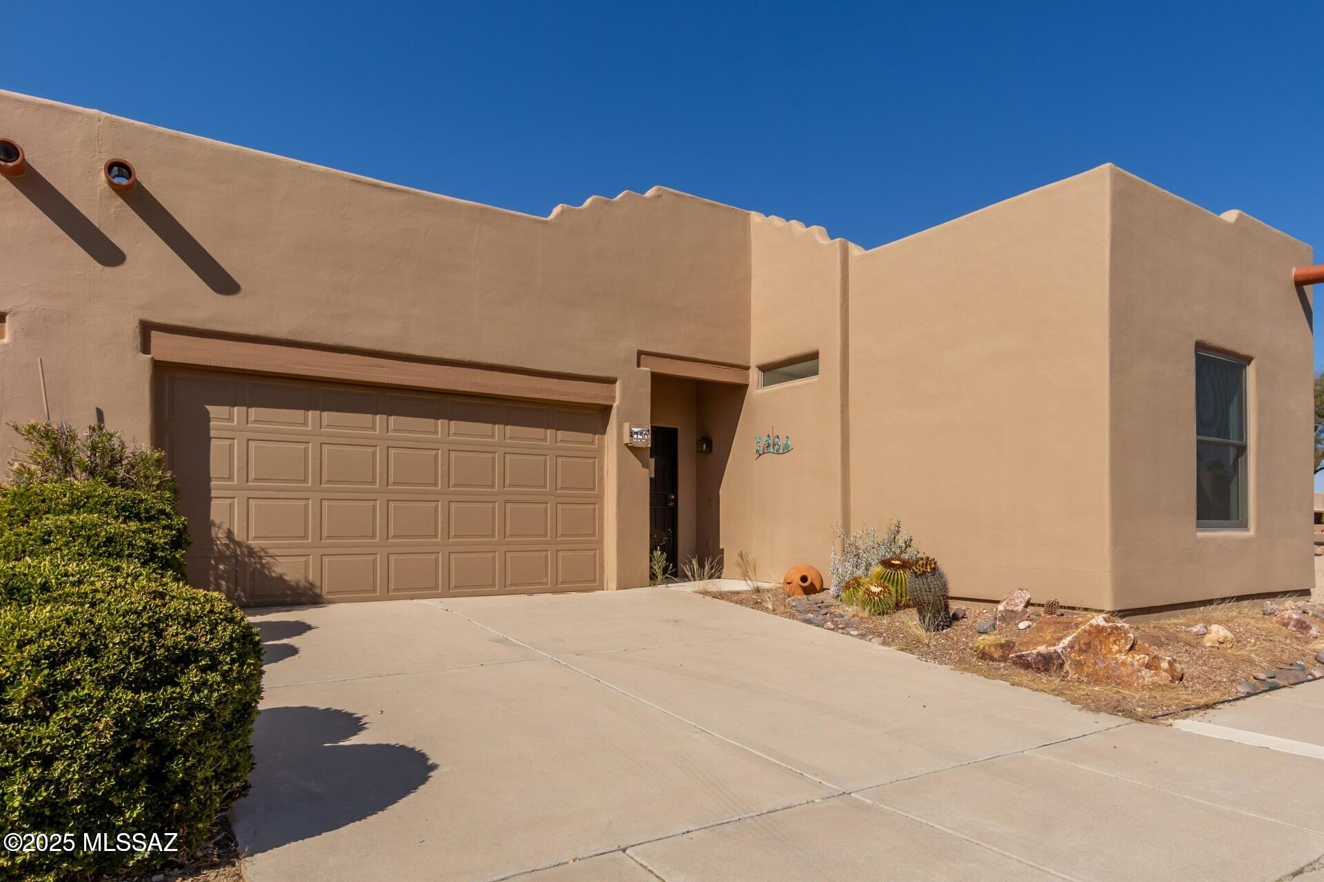 Welcome to this charming 2-bedroom, 2-bath townhome in Roadhaven Resorts in Green Valley! You'll be delighted by the spacious great room with high ceilings, a soothing palette, classic plantation shutters, tile flooring for easy maintenance, and a cozy fireplace that sets an inviting atmosphere. The kitchen comes with ample wood cabinetry, built-in appliances, a pantry, and a two-tier peninsula with a breakfast bar for casual meals. Relax after a long day in the main bedroom, complete with warm wood flooring, a walk-in closet, and a bathroom for added privacy. Find solace on the open patio during quiet afternoons with a good book and a refreshing drink to complete the serene escape. Don't miss out on this fantastic opportunity!