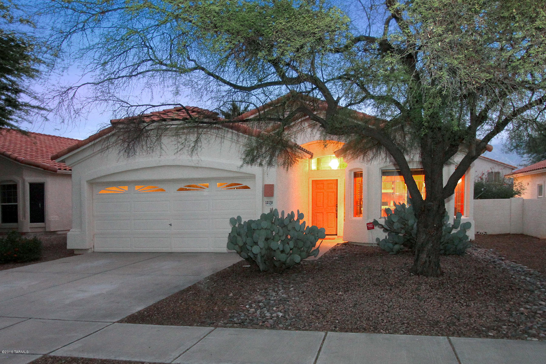 Very cute 3 bedroom 2 bath tiled roof home located in a convenient Rancho Vistoso neighborhood. Large Great Room  off the Kitchen offers high ceilings and access to the east facing covered patio. Split Bedroom plan; Master retreat has a walk-in shower and soaking tub, dual sink vanity, and walk-in closet. This property offers mature landscaping w/fruit trees and mountain views.