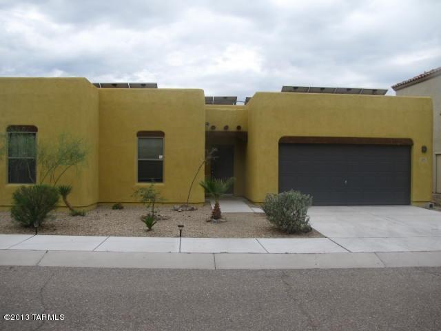 Spacious 3 bedroom 2 bathroom house in gated community. New paint throughout, raised ceilings and kitchen with breakfast bar. Master has large walk-in closet and garden tub in master bath. Split bedroom plan. Also includes solar panels for low cost electric bills!! Includes community pool and playground. Close to DMAFB and Raytheon.