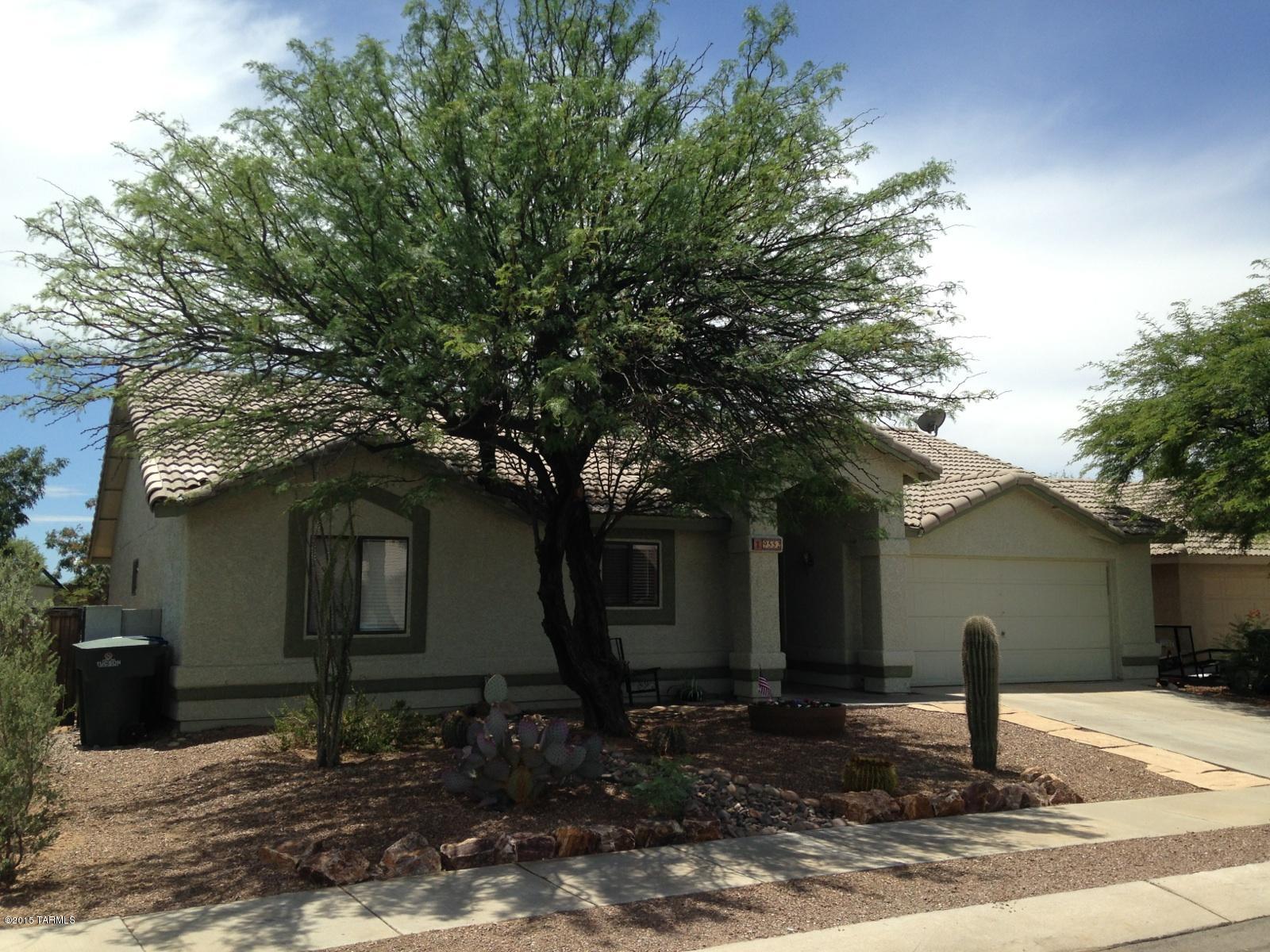 Don't miss your chance to invest in a home in Rita Ranch. Just a short distance from Purple Heart park and A+ Vail schools! This home features a large pool next to landscaped shaded back yard space. There aren't any neighbors directly behind property which adds to its privacy. The split floor plan layout maximizes the living space and natural light illuminates home. Conveniently located close to I-10 and the rapidly developing Houghton corridor. This property is unique in that it has no HOA!