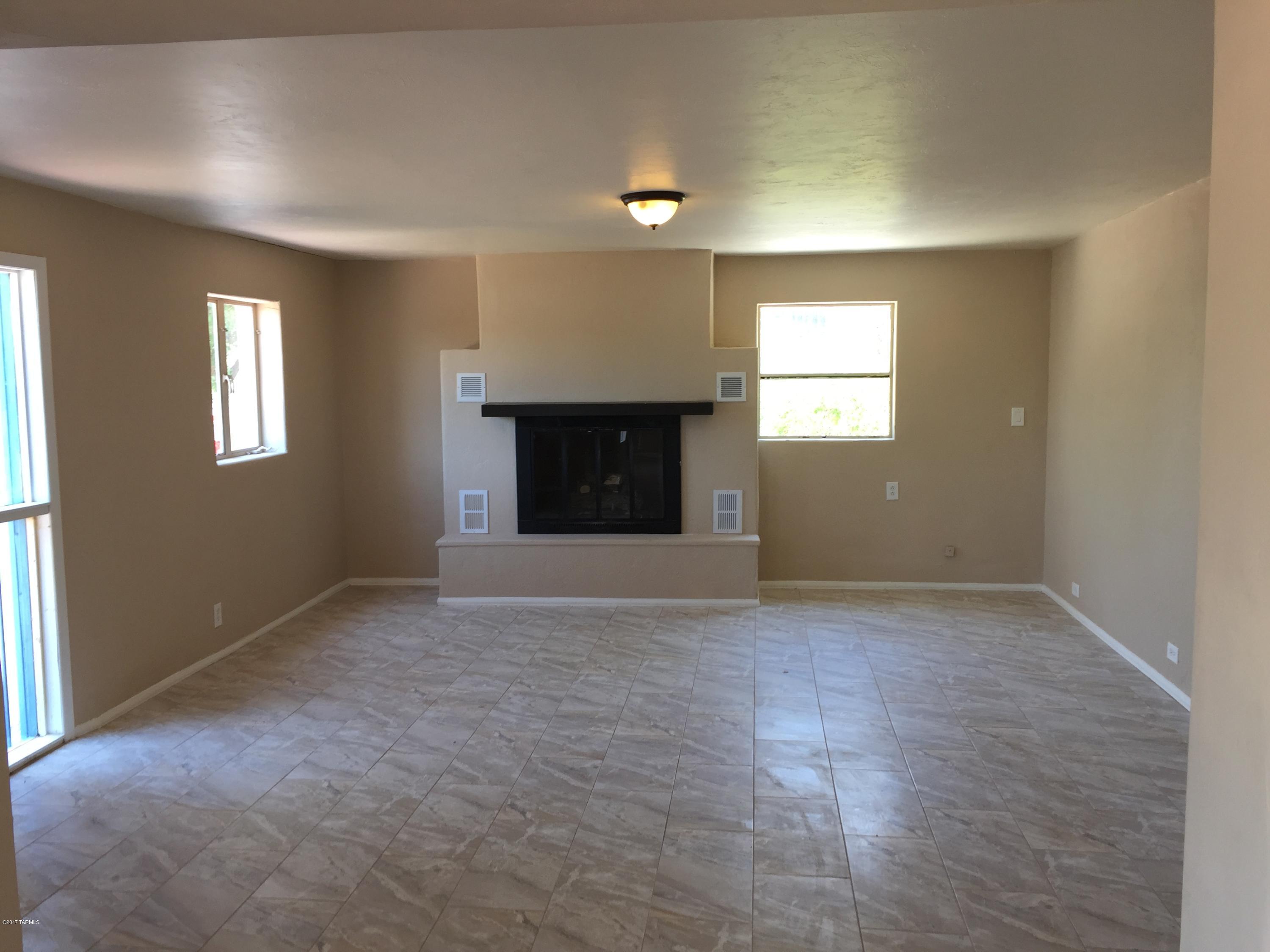 BACK ON MARKET! Beautifully restored real mud adobe home. This spacious 2 bedroom home has been remodeled and is ready for entertaining. New AC, floors, paint and fixtures. Incredibly well insulated. Don't let this one get away!
Storage building/workshop in yard was built without permits.