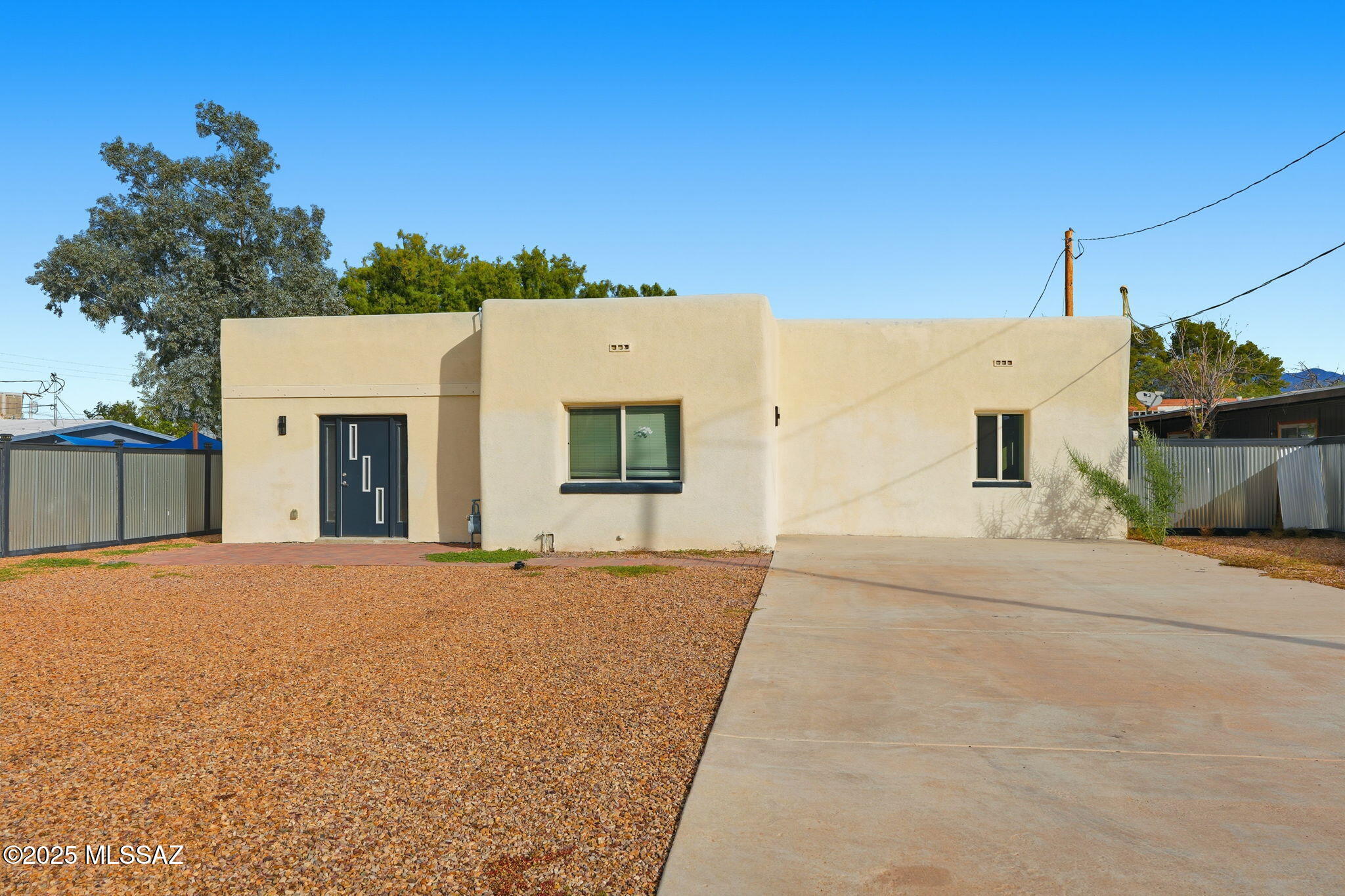 Welcome home to 3525 E Willard St — a bright 3 bedroom, 3 bath rental offering generous living space (2,129 sq ft). Enjoy tile floors throughout, an expansive kitchen that invites home cooking and gatherings, and a fully fenced backyard with patio — an ideal private oasis for dog owners and outdoor downtime. Recent upgrades deliver a clean, contemporary feel to the space. Large and small dogs welcome (no cats). With quick access to the University of Arizona and nearby shopping and dining, this home is perfect for those seeking convenience, comfort, and low-maintenance living in Tucson. Ask about showings today. This property uses a self-showing system; register on our website to schedule a viewing.