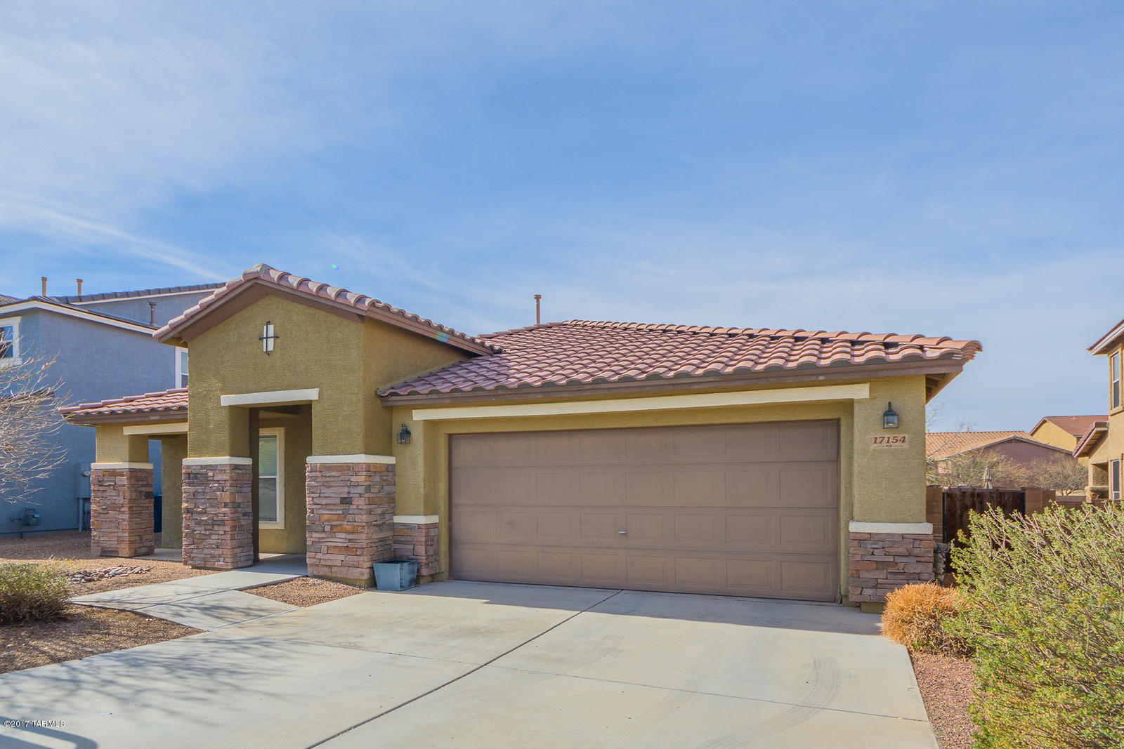 Large family room with separate living room and large kitchen space. Located in Santa Rita Ranch and the Vail School District! Master bath has stand alone shower and garden tub. Large spacious bedrooms, covered back patio with a serene landscaped back yard!