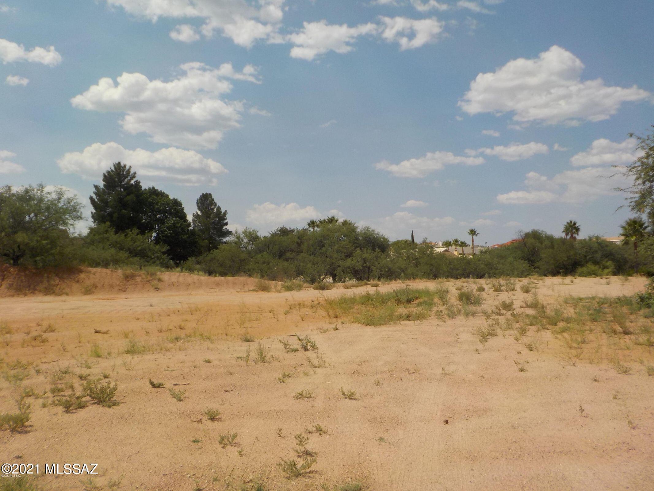 Build your dream home on this level lot in the Meadow Hills Subdivision.  This .44 acre lot has been graded and is located in a cul-de-sac.   Centrally located in Nogales, close to shopping, schools and medical facilities.  Utilities are nearby.