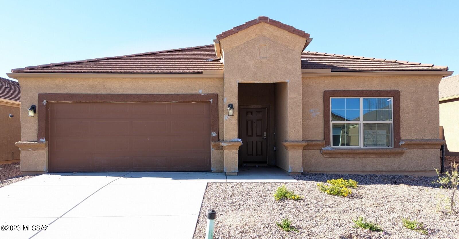 The 1-Story Justin model located in the Saguaro Bloom Community offers a 1,854 sqft floorplan with 4 bedrooms, 2 bathrooms and a 2 car garage. ++ Self Cleaning Stainless Steel Electric Range with Microwave & Dishwasher - Granite Countertops in the Kitchen & Cultured Marble in Bathrooms - Tile floors in Entry, Kitchen, Dining Room, Laundry Room & Bathrooms -  42'' Birch Straight Cabinets - DuPure® Ultra Filter Single Stage® Water Filtration -  Rinnai® Tankless Water Heater - Colored Block Walls - Rounded Drywall corners - Five-Panel Rockport Interior Doors with Chrome Lever - 9-foot Ceilings -  Saguaro studded cliffs and stunning sunsets abound at this hidden gem of a community.