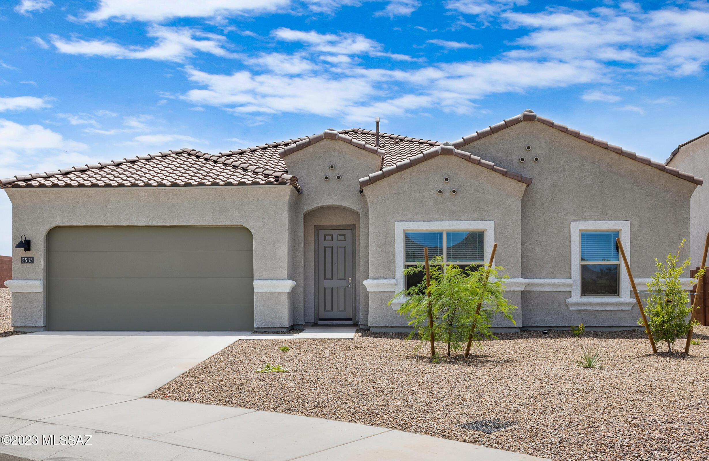 Bring All OFFERS. Price Reduced for Quick Sale on this BRAND-NEW HOME!!
 Be the first to live in this beautiful 2577 sq ft home. Nestled in the preserve of the Tortolita Mountains and tucked down at the end of the cull de sac, this premium homesite offers unobstructed views of both the beautiful Tortolita Mountains and Preserve. Living here in Dove Mountain you will enjoy several golf options at both the Ritz Carlton Dove Mountain Golf Resort and The Gallery Golf Club. There is a myriad of living options within this highly upgraded five-bedroom/3 bath home. Maintenance free landscaping provides easy outdoor living.