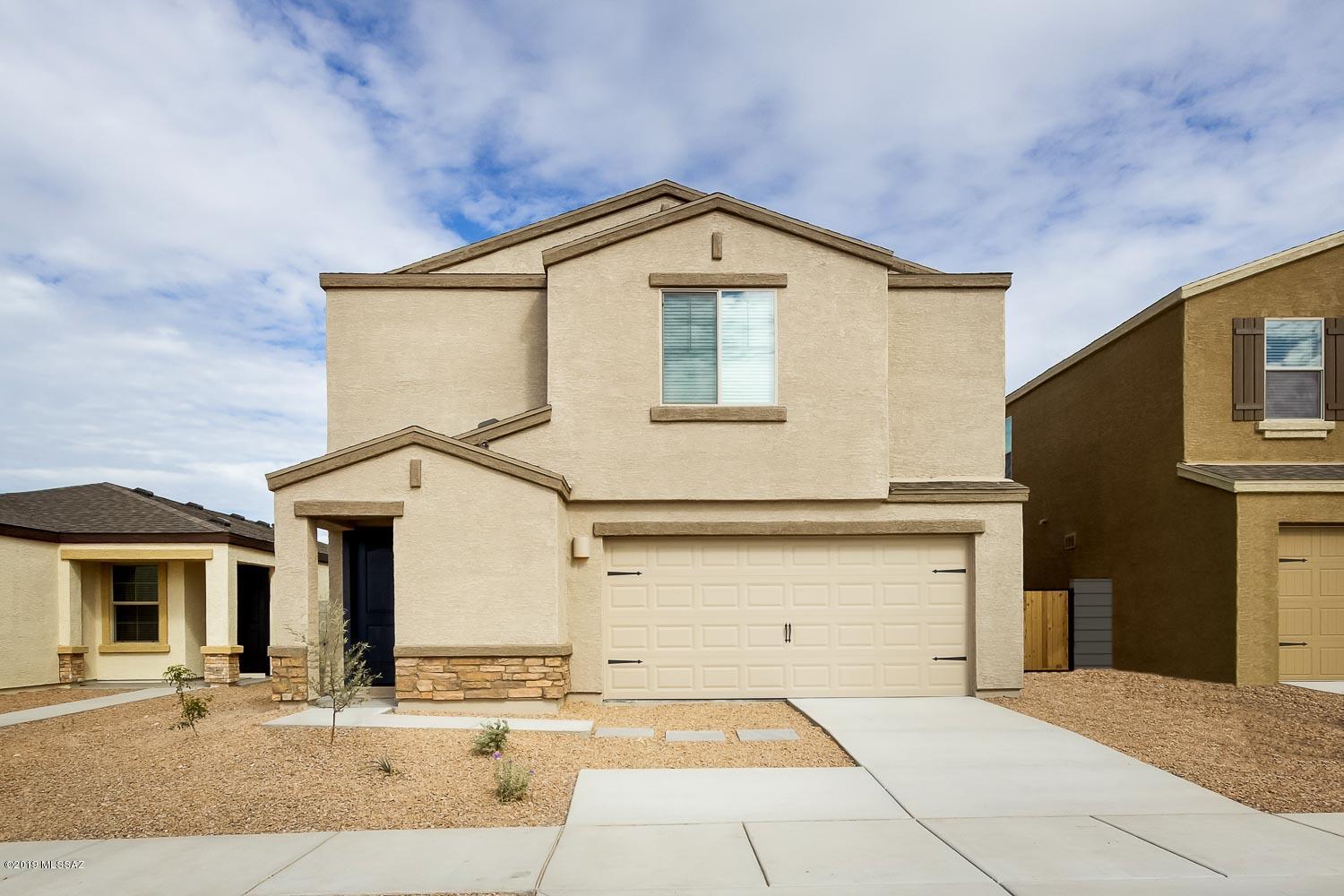 The Mesquite is a 4 bedroom, 2 and a half bath home located in the beautiful community of Cantera. This new home comes with thousands of dollars in upgrades including energy-efficient appliances, granite countertops, stunning wood cabinets, brushed nickel hardware and an attached two-car garage. The Mesquite floor plan is made for entertaining, showcasing a spacious great room open to the dining room and chef-ready kitchen. As an added bonus, the Mesquite has a tech loft upstairs for homeowners to use as a versatile space. The Mesquite plan can be found in the community of Cantera which offers a variety of local parks and attractions nearby. To schedule a tour of this home, please call  520-849-6120 ext 19.