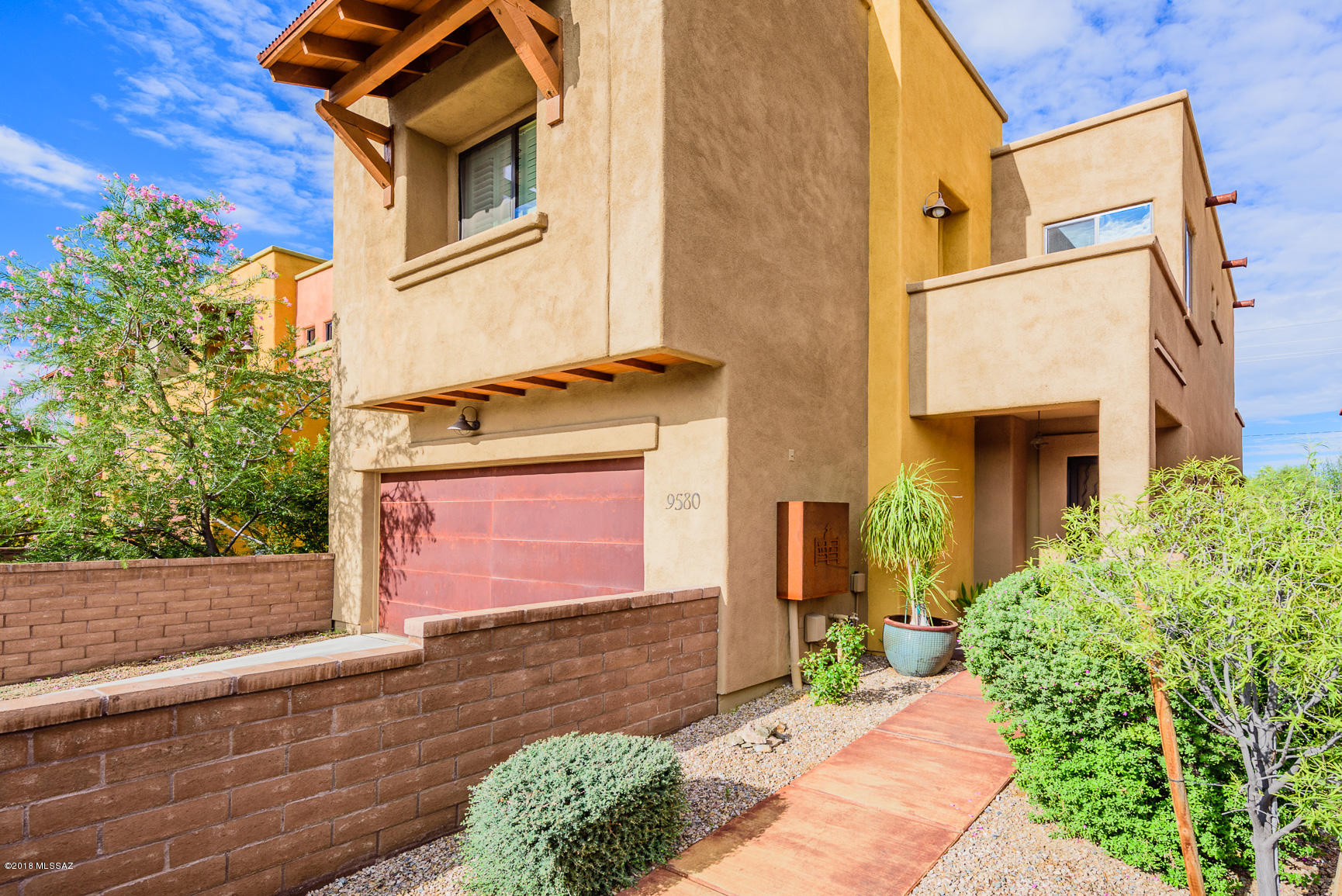 Built in 2013 extra square footage included approx. 2300 sq.ft., 4/3 plus Office with Twin Murphy Bed, 2 baths upstairs & 1/2 bath downstairs. 2 Car Garage with 2 walls of new cabinets. Central H & A {additional 20 inch crawl space between 1&2 story} with separate thermostat for the 1st & 2nd story. Extras include ceramic tiles floors/living-room all bathrooms & kitchen. Plantation shutters, 10 ft. ceilings downstairs. Steel screen front door, 2 Verandas. Finished patio with new stone, irrigation and artificial putting green. Landscaped front & back yards, all ceiling fans w/ remote controls, kitchen,under counter lights, many walk-in closets. All Appliances, new stainless steel (all new in 2013) built in oven and microwave, dishwasher, refrigerator, stove and washer & dryer. Reverse Osmosis soft water in refrigerator, and separate drinking faucets in kitchen sink.