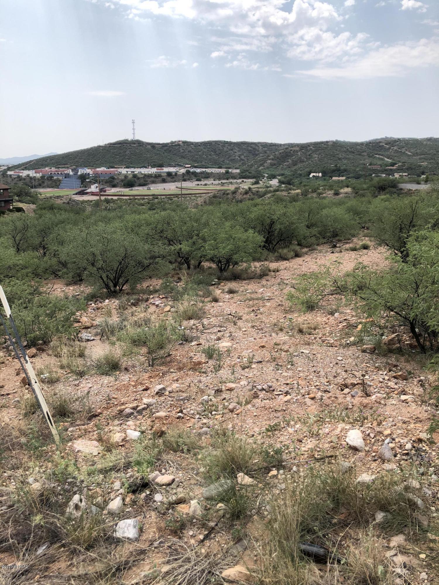 Residential lot close to schools and highway entrance, paved road, electric and water at the street, nice views  Lot has been staked and flagged.  See attached map and go ahead and walk the property to see where the lot lines are.  Very gentle slope.